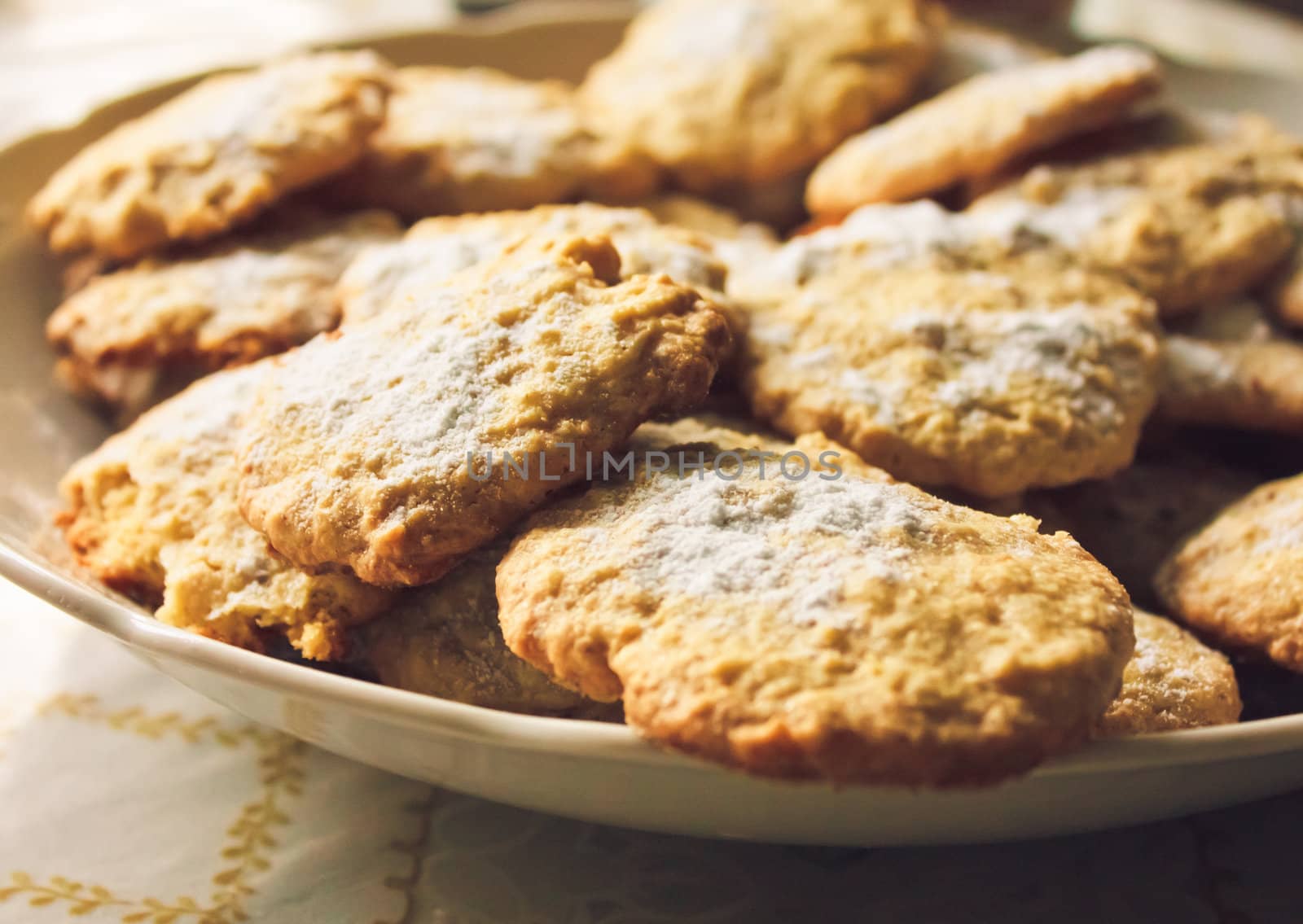 Group of homemade oats cookies closeup on a dish