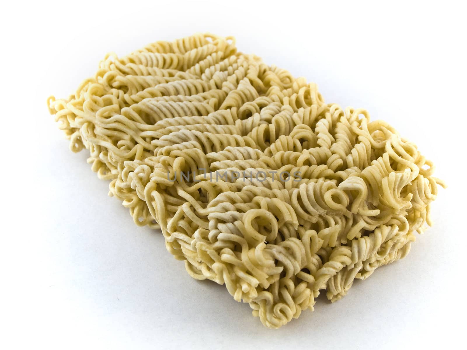 Dried Egg Noodles on White Background