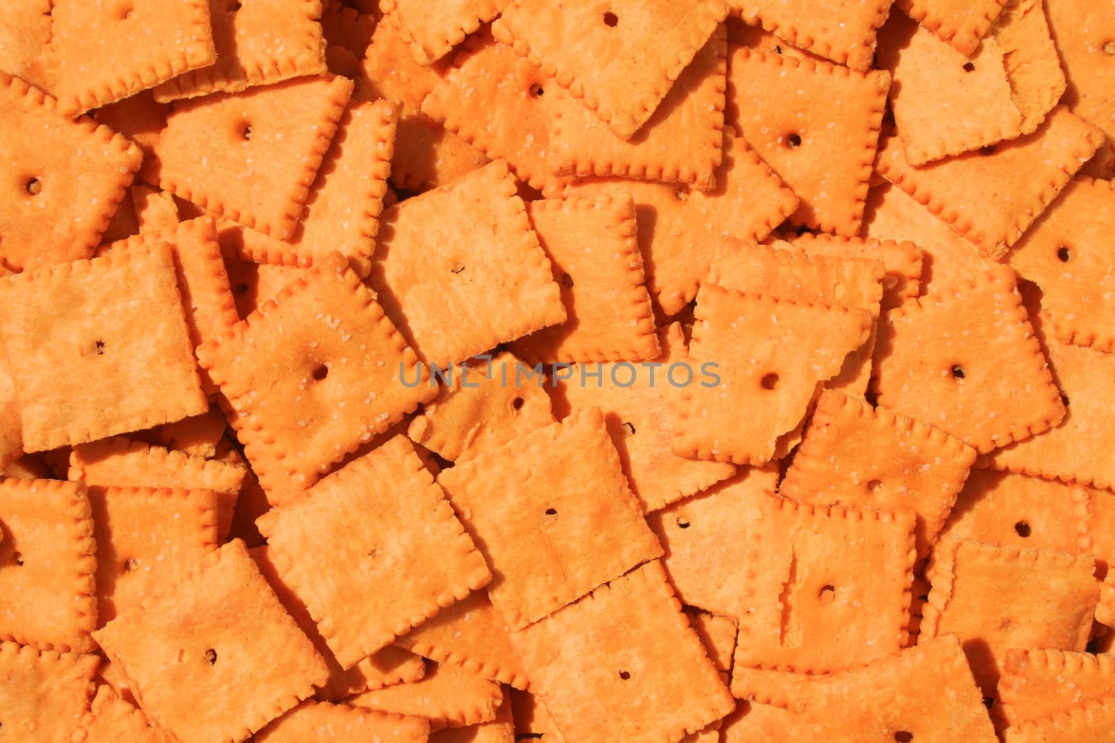 Close up of orange cheese crackers.
