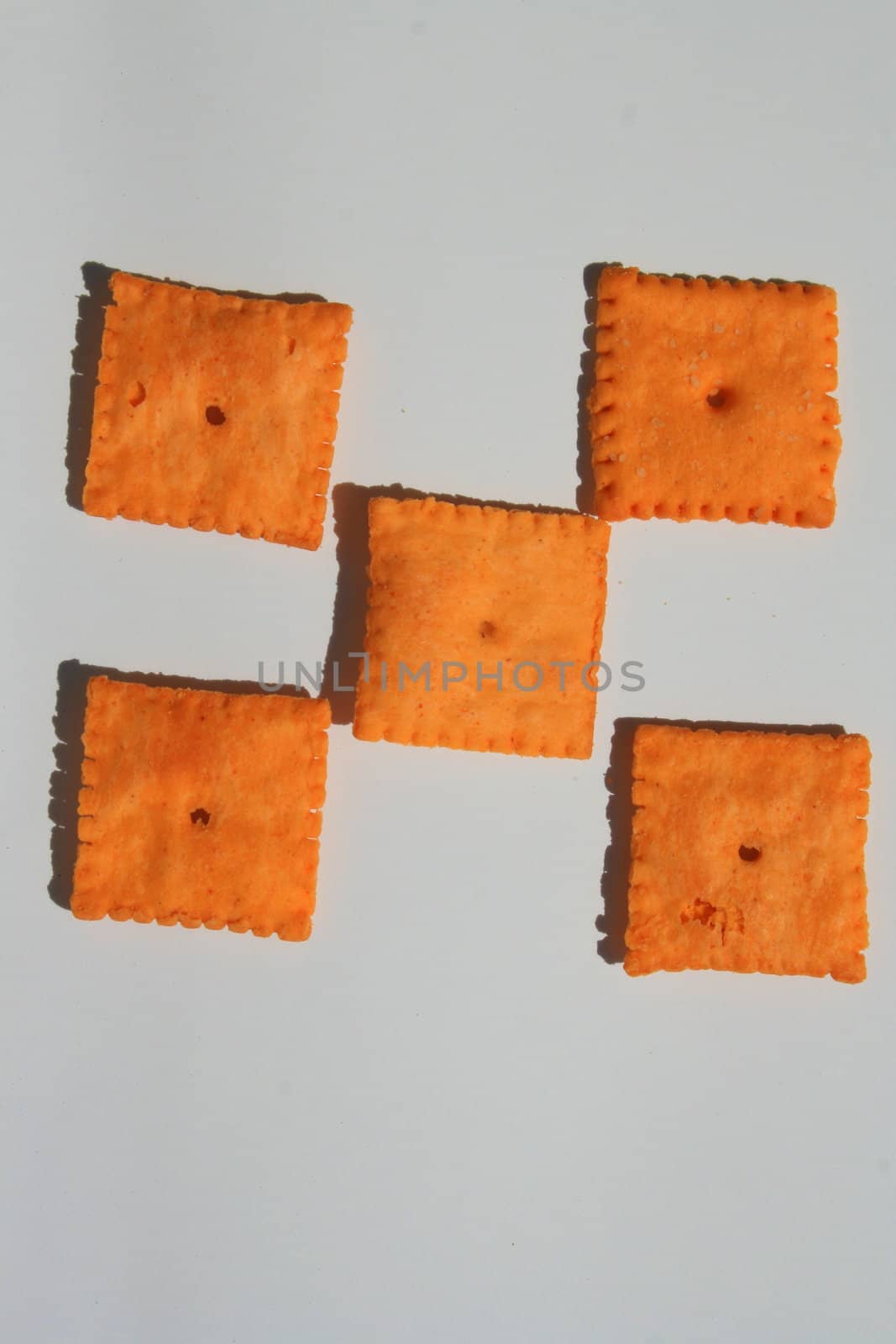 Close up of orange cheese crackers.
