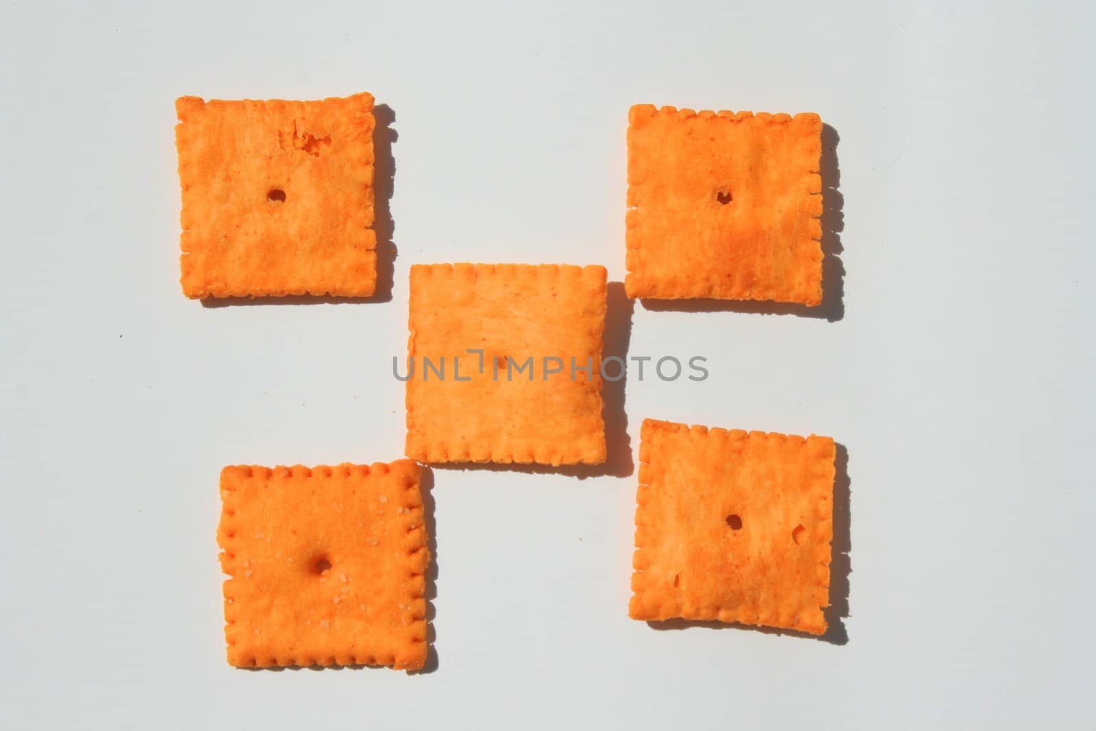 Close up of orange cheese crackers.
