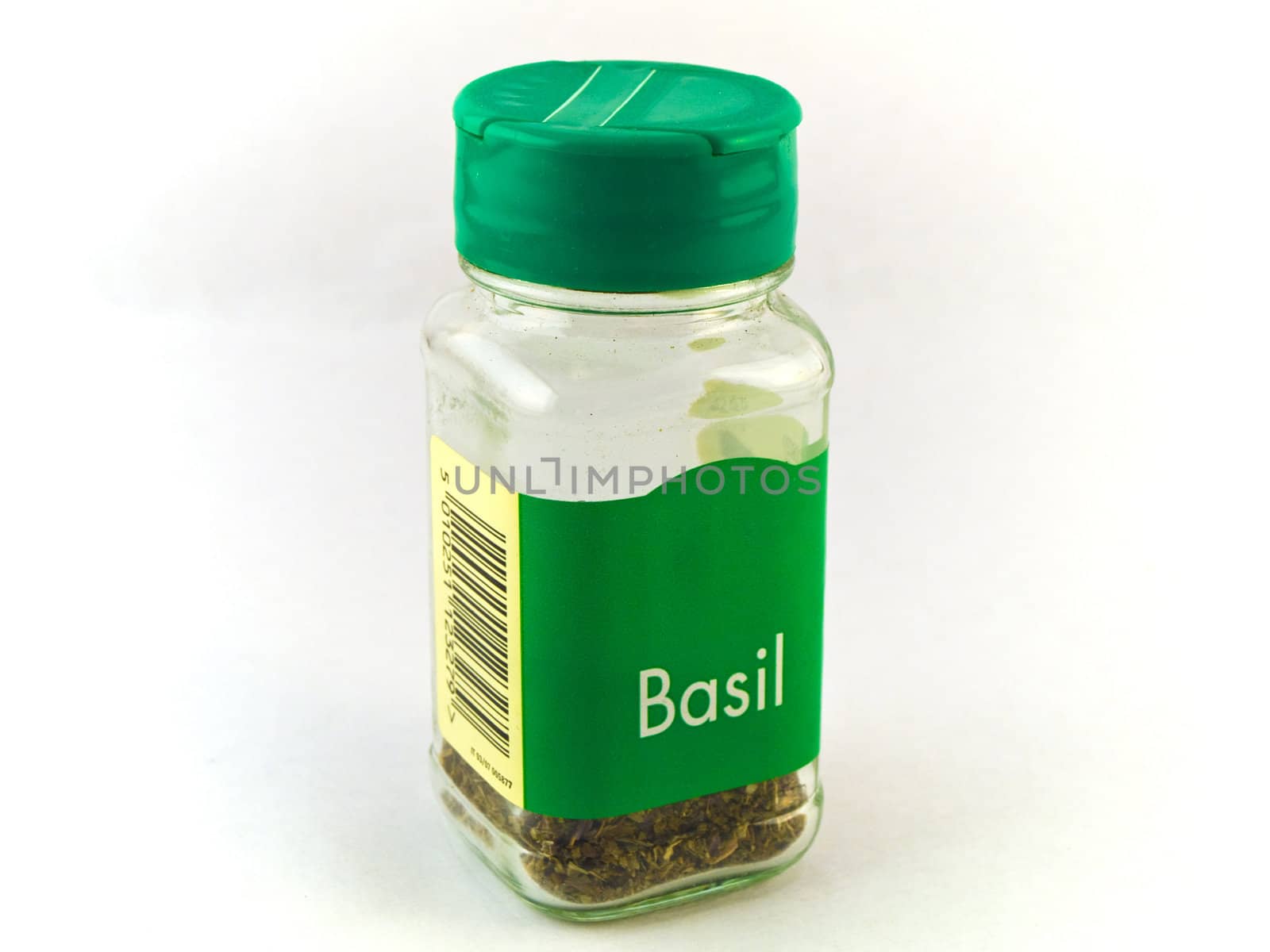 Jar of Basil Herbs on White Background by bobbigmac