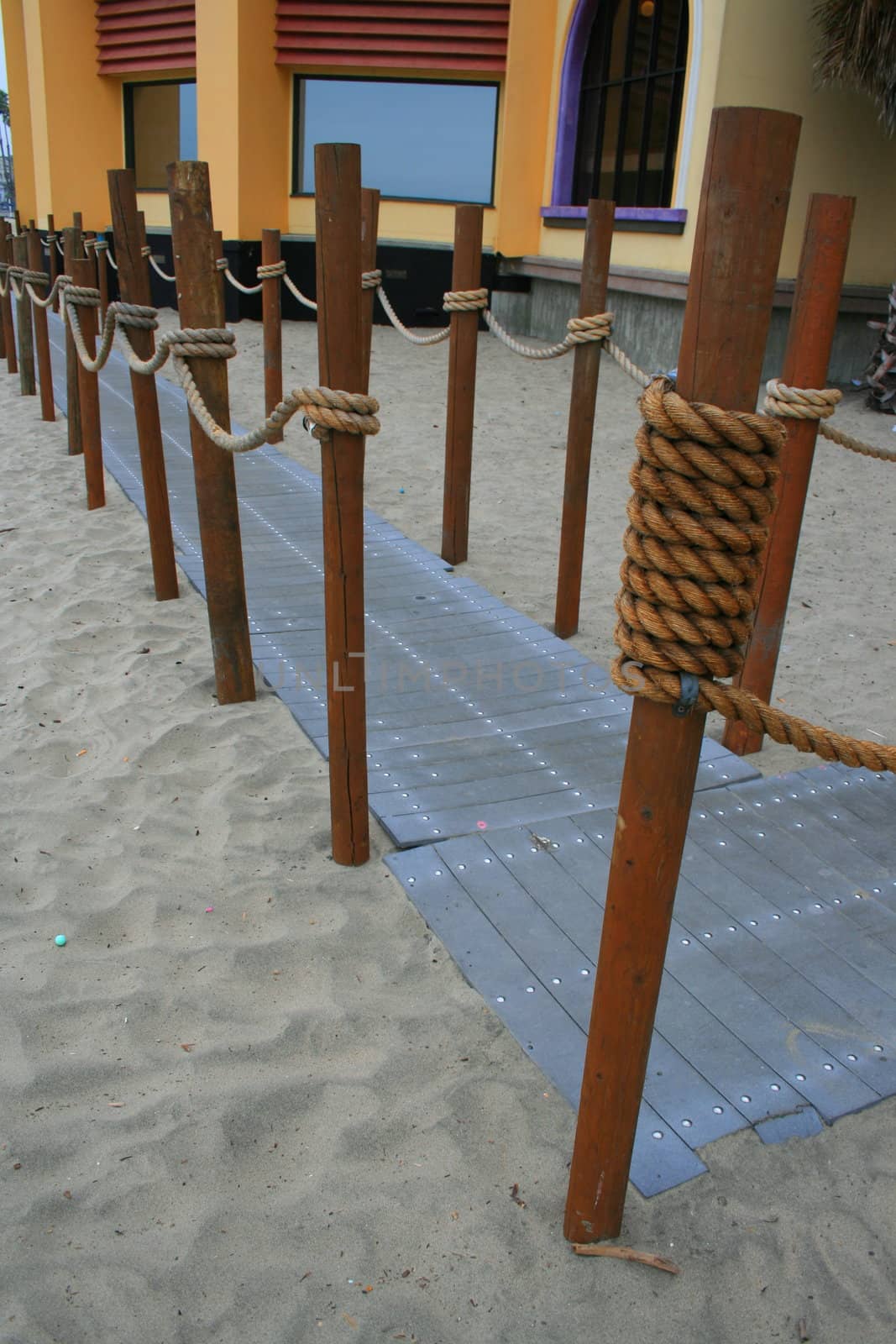 Close up of a decorative pathway on a beach.
