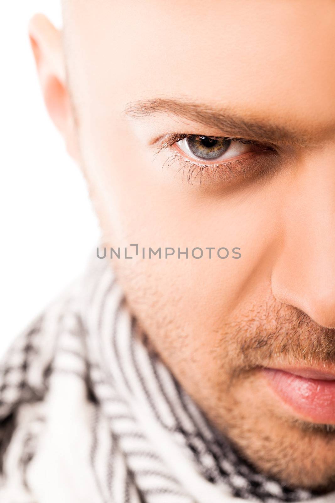 Close-up of handsome male half face, isolated on white