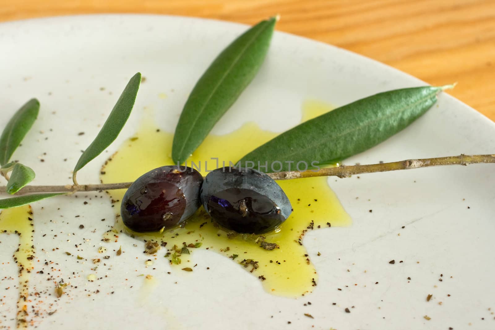 Black Olives and oil on dish