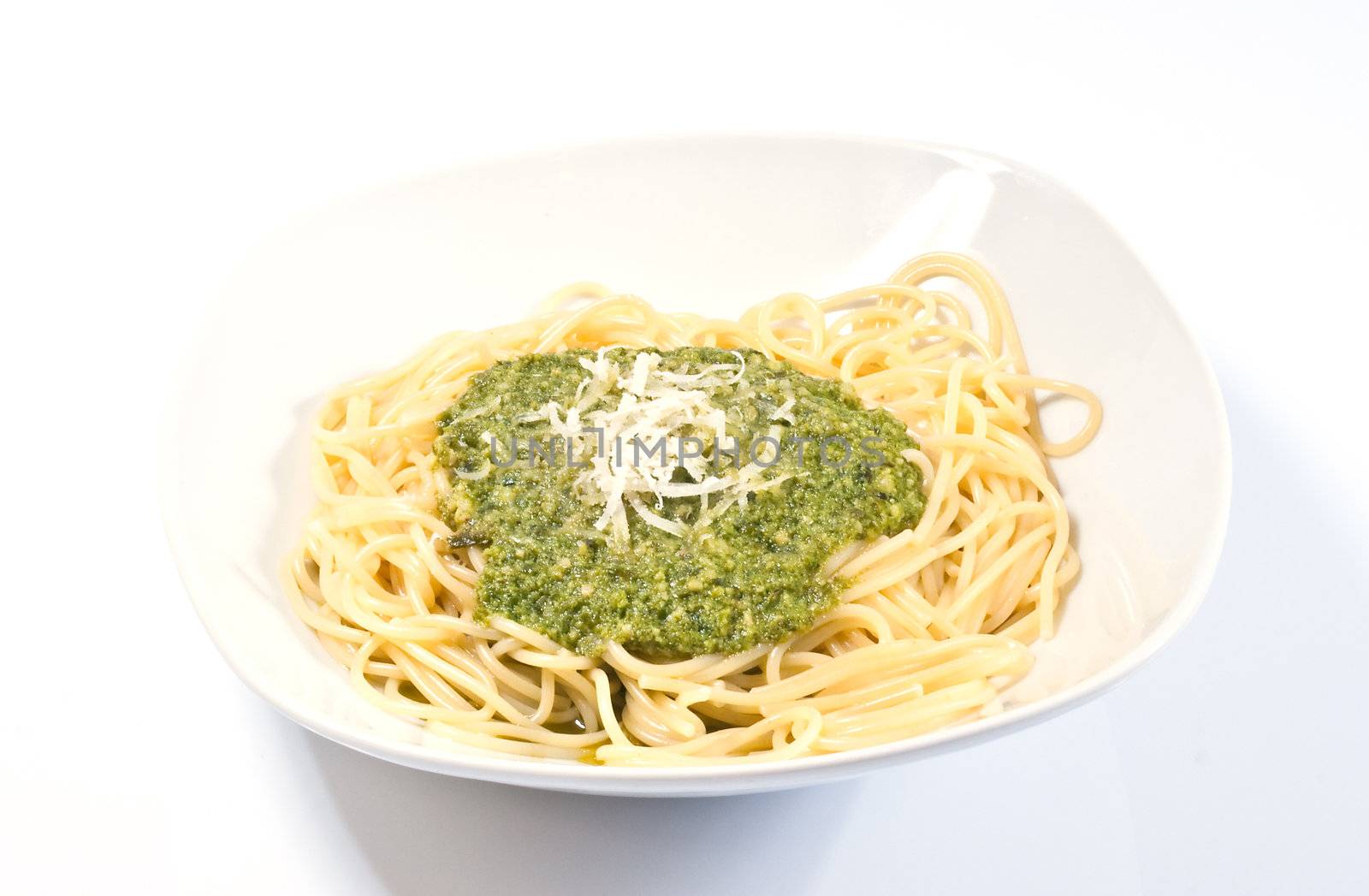 Pasta with pesto on white background, Genovese recipe