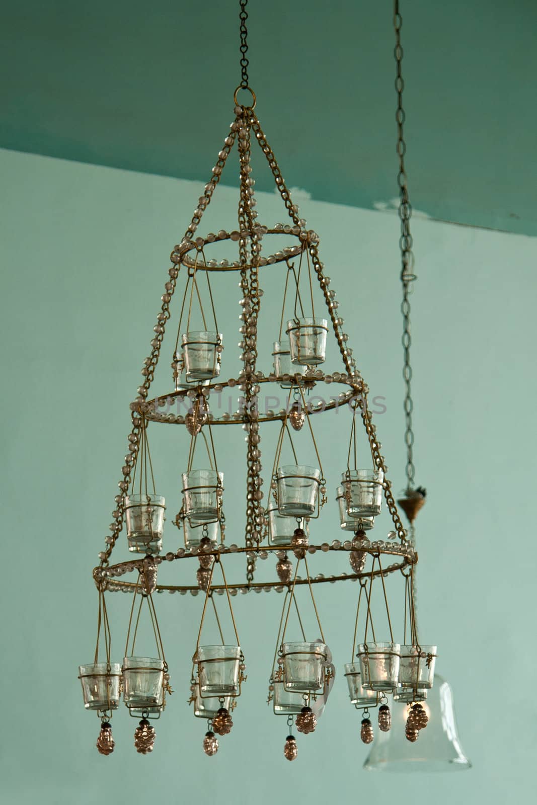 Candles Chandelier in vintage retro style hanged in a mansion house