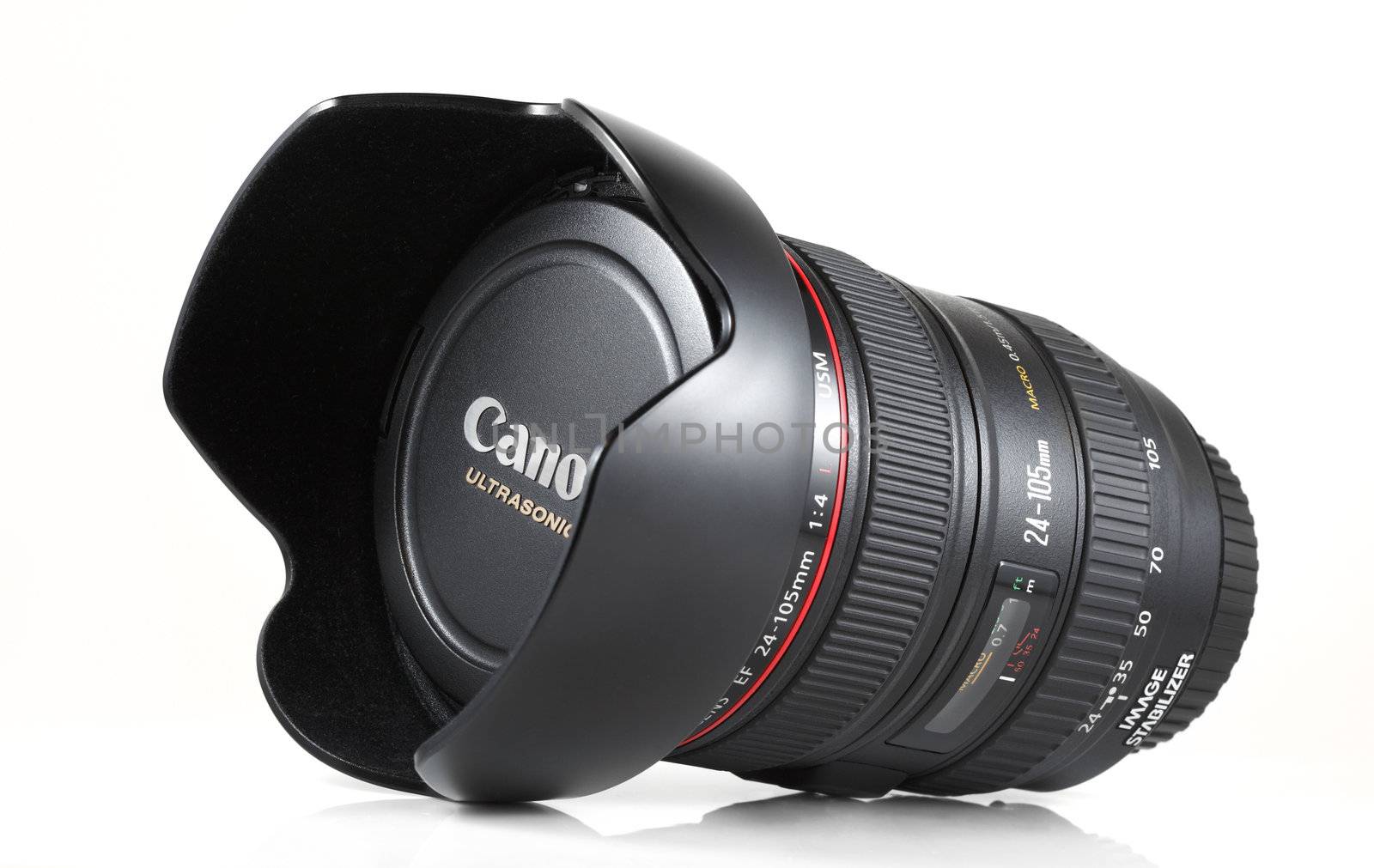 An isolated studio shot of a Canon 24-105mm f/4L IS USM standard zoom lens.