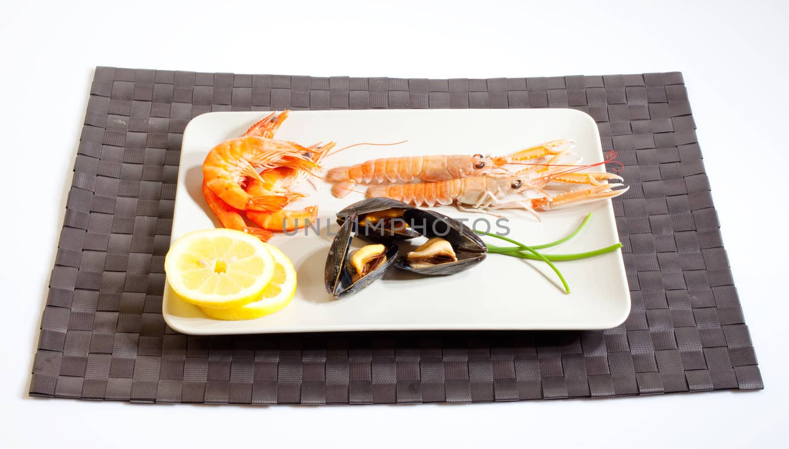 Mussels lemon and crustacean on dish