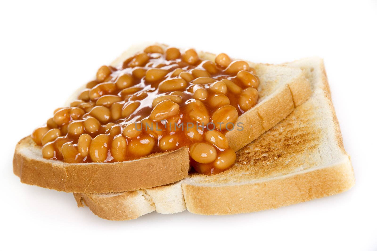 Baked beans on toasts - isolated