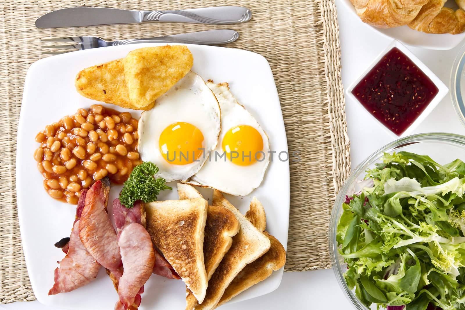 Breakfast with salad croissants and jam