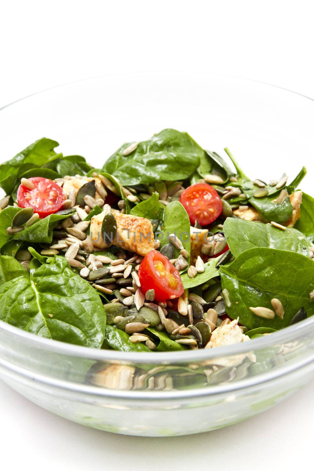 Spinach salad over white background