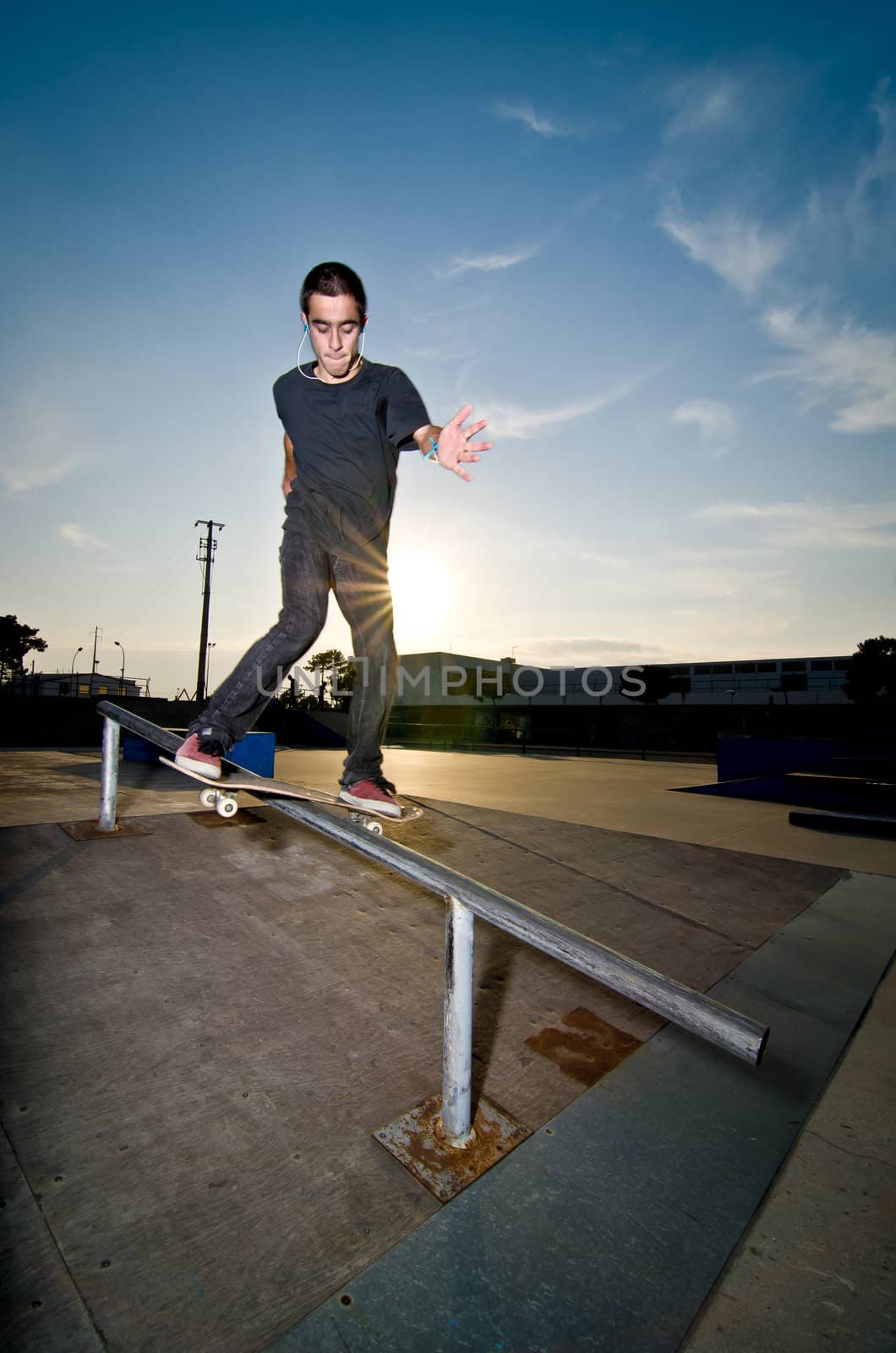 Skateboarder on a slide by homydesign