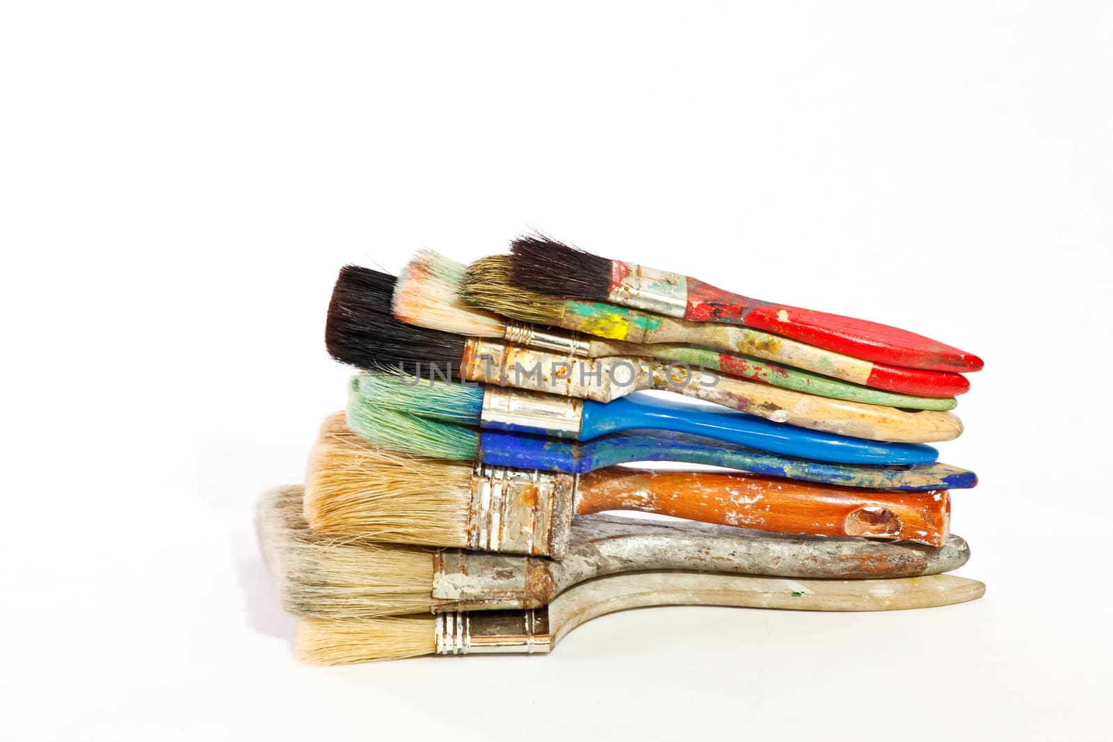 Paintbrushes on white background