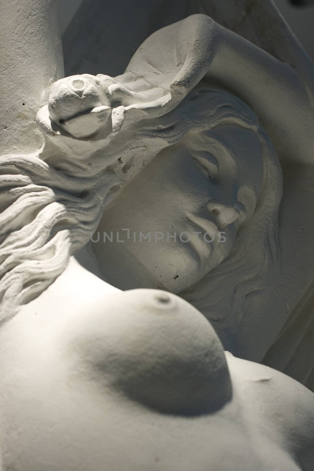 Detail of a sensual Woman statue