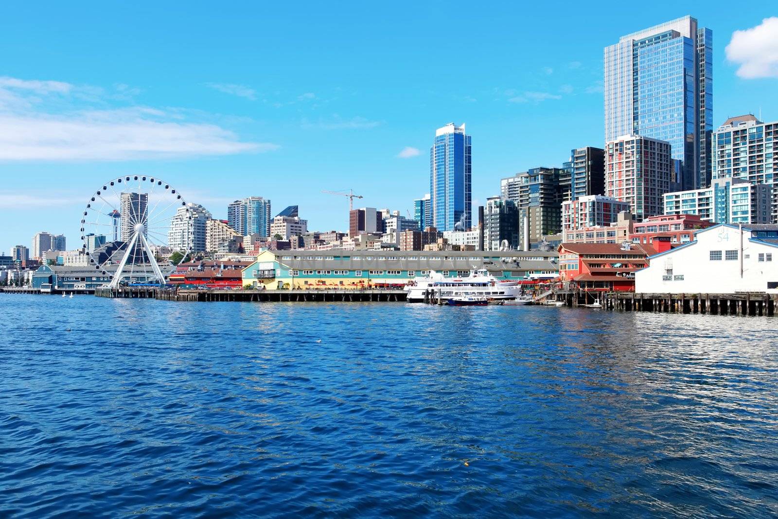 Seattle waterfront Pier 55 and 54. Downtown view from ferry.