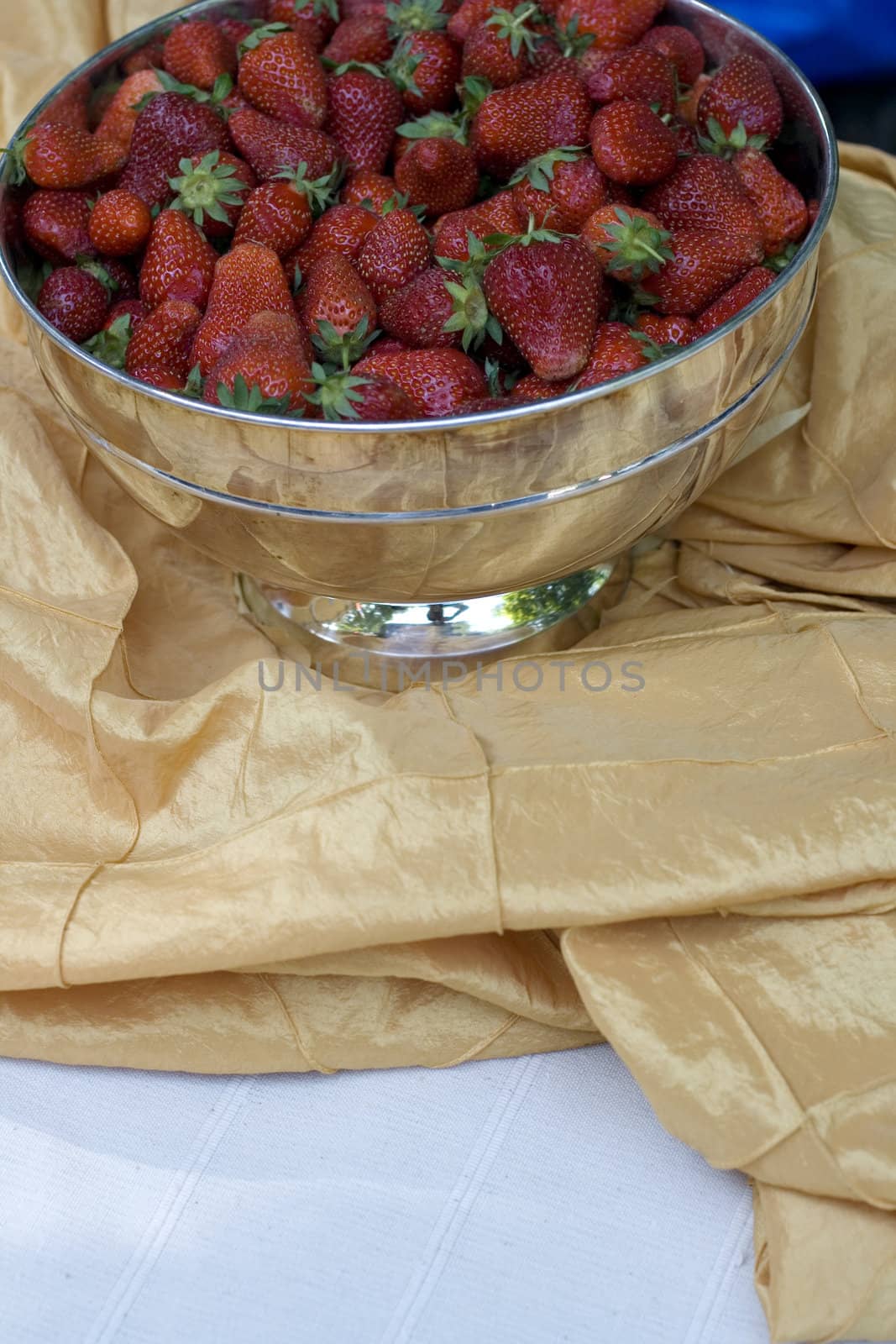 Fresh strawberry inside a silver bowls