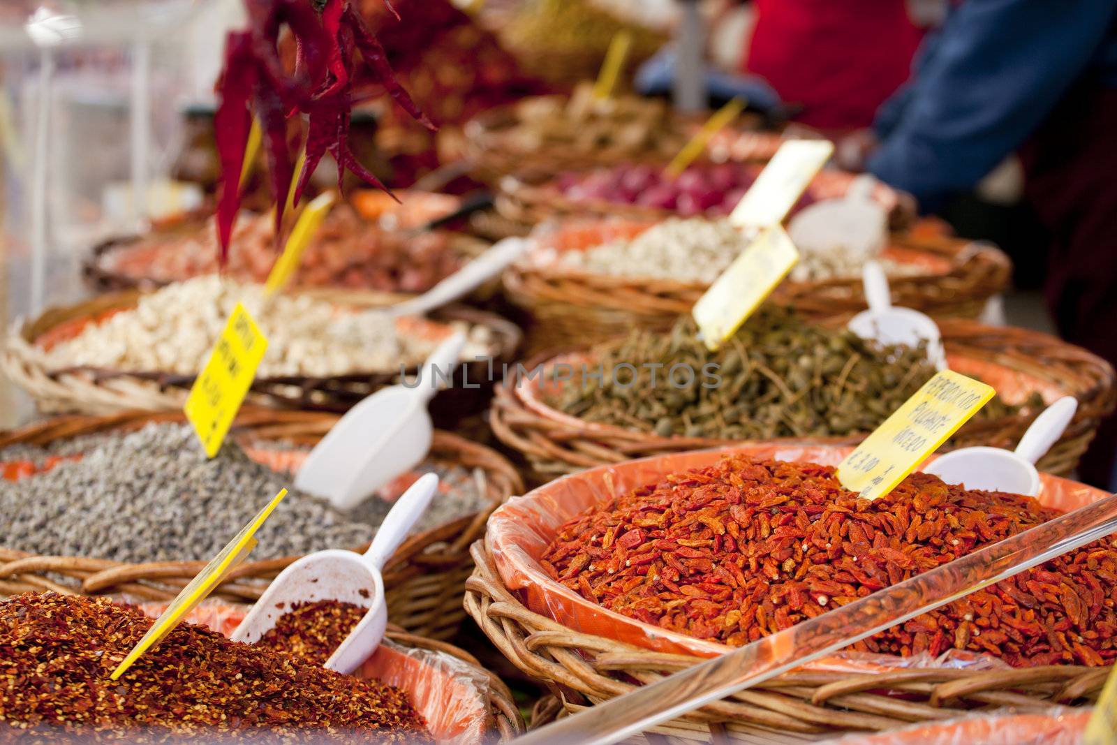 Spices on wooden basket in a street market