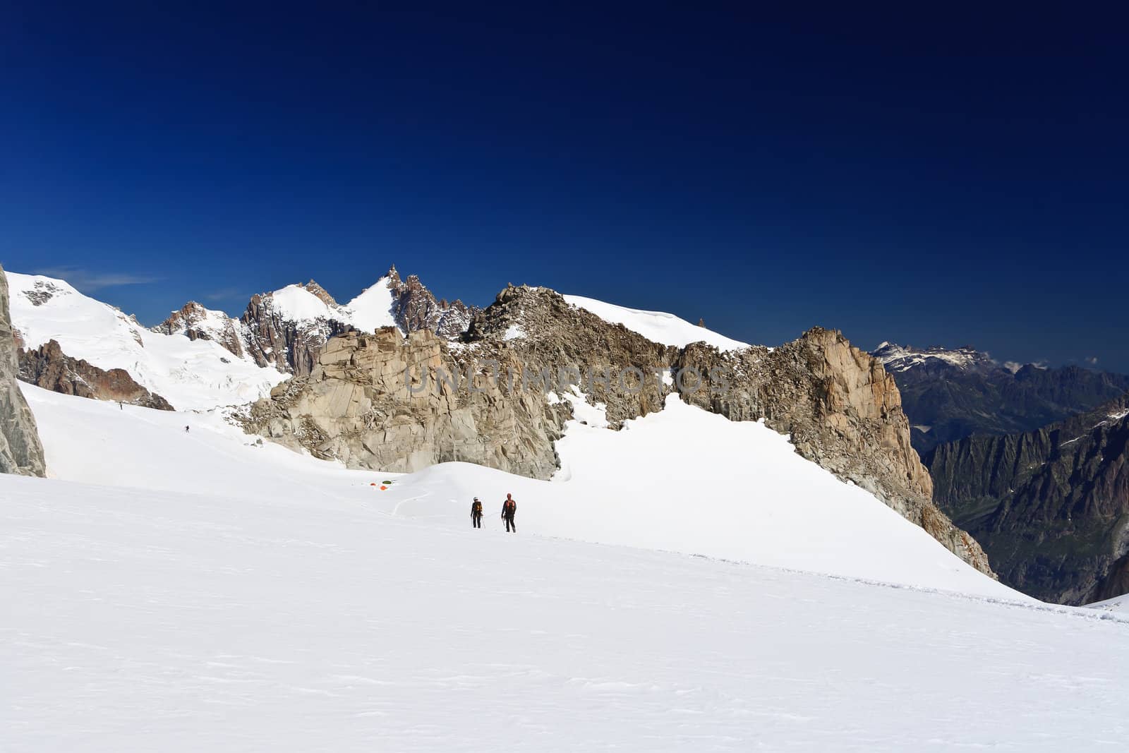hikers on Mer de Glace glacier, Mont  Blanc massif
