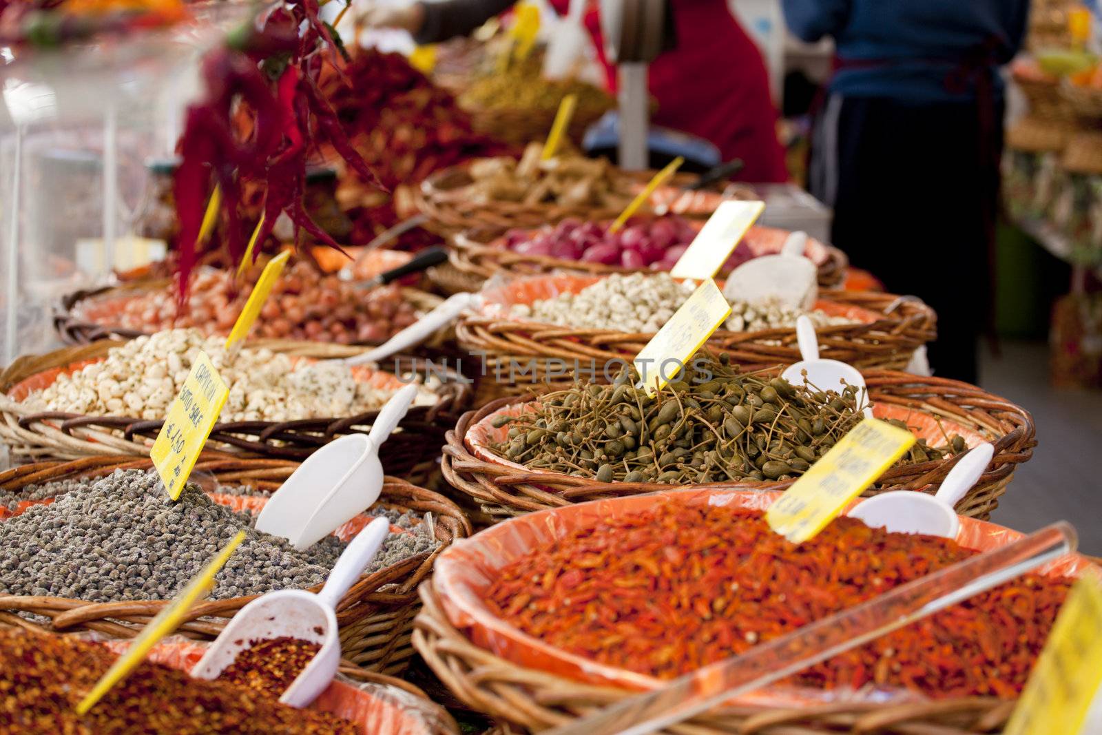 Spices on wooden basket in a street market