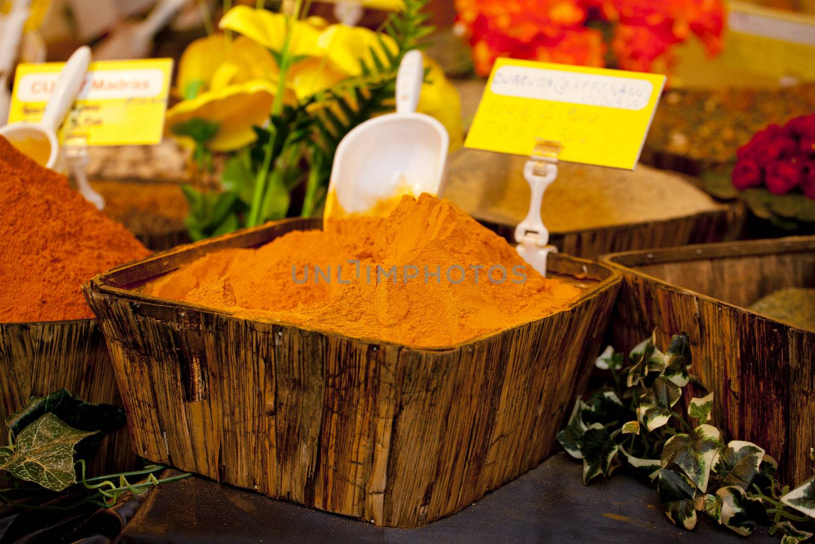 Turmeric on wooden basket in a street market