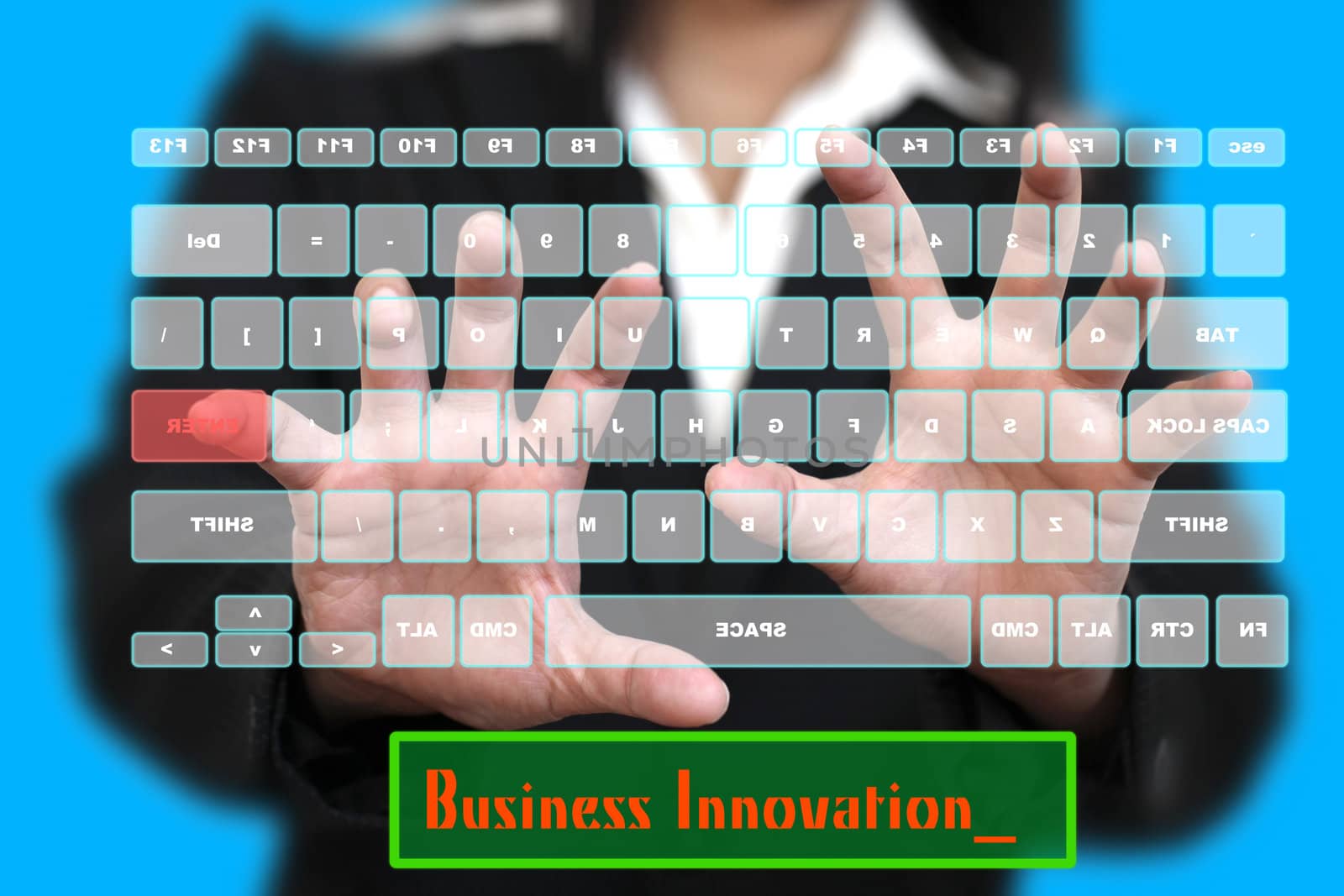 BusinessWoman typing Business Innovation on Virtual Keyboard