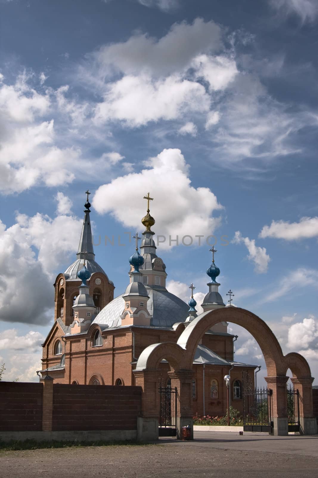 Rural church on a background of the blue sky