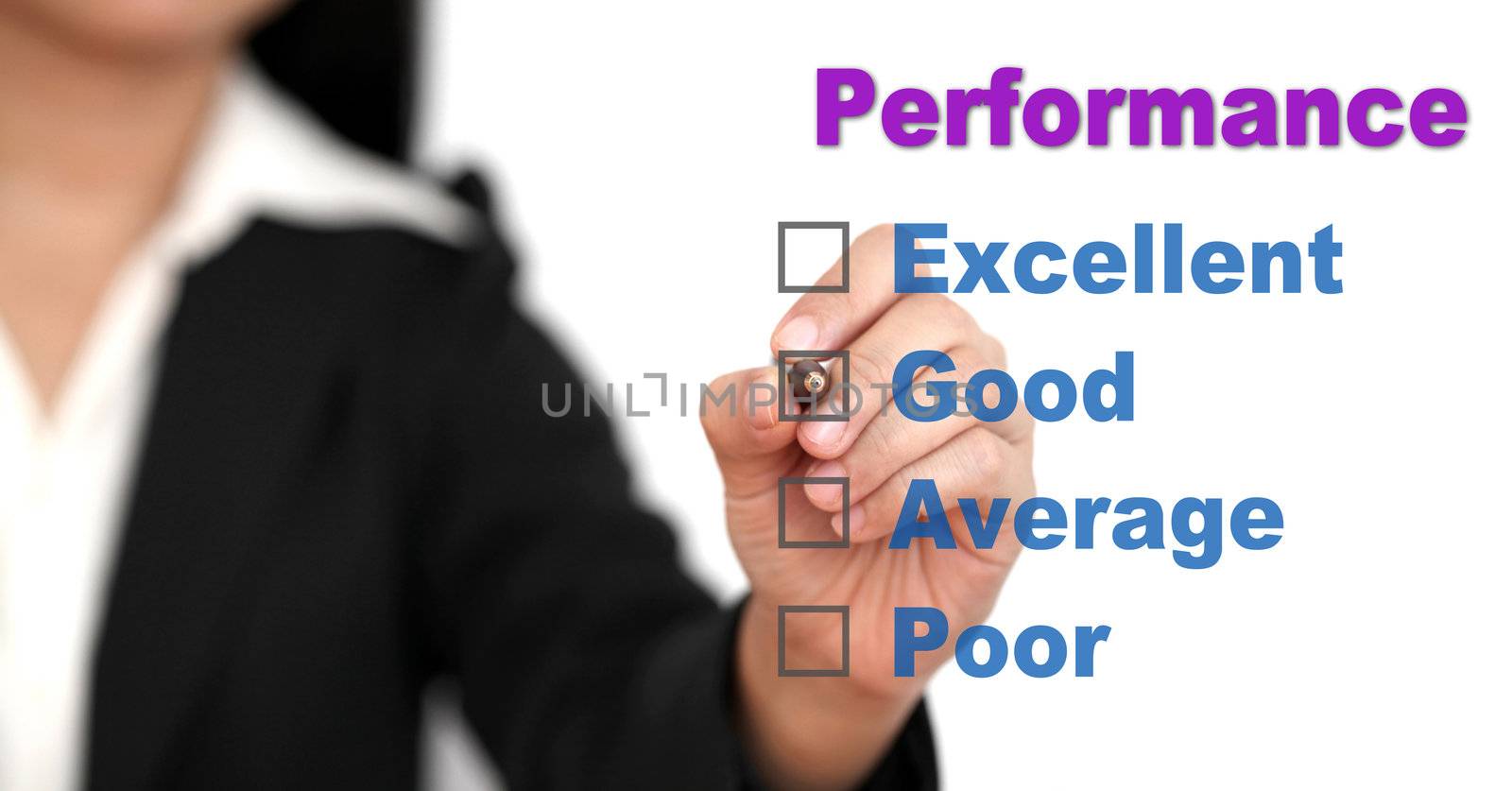 Asian business woman writing on performance audit checklist