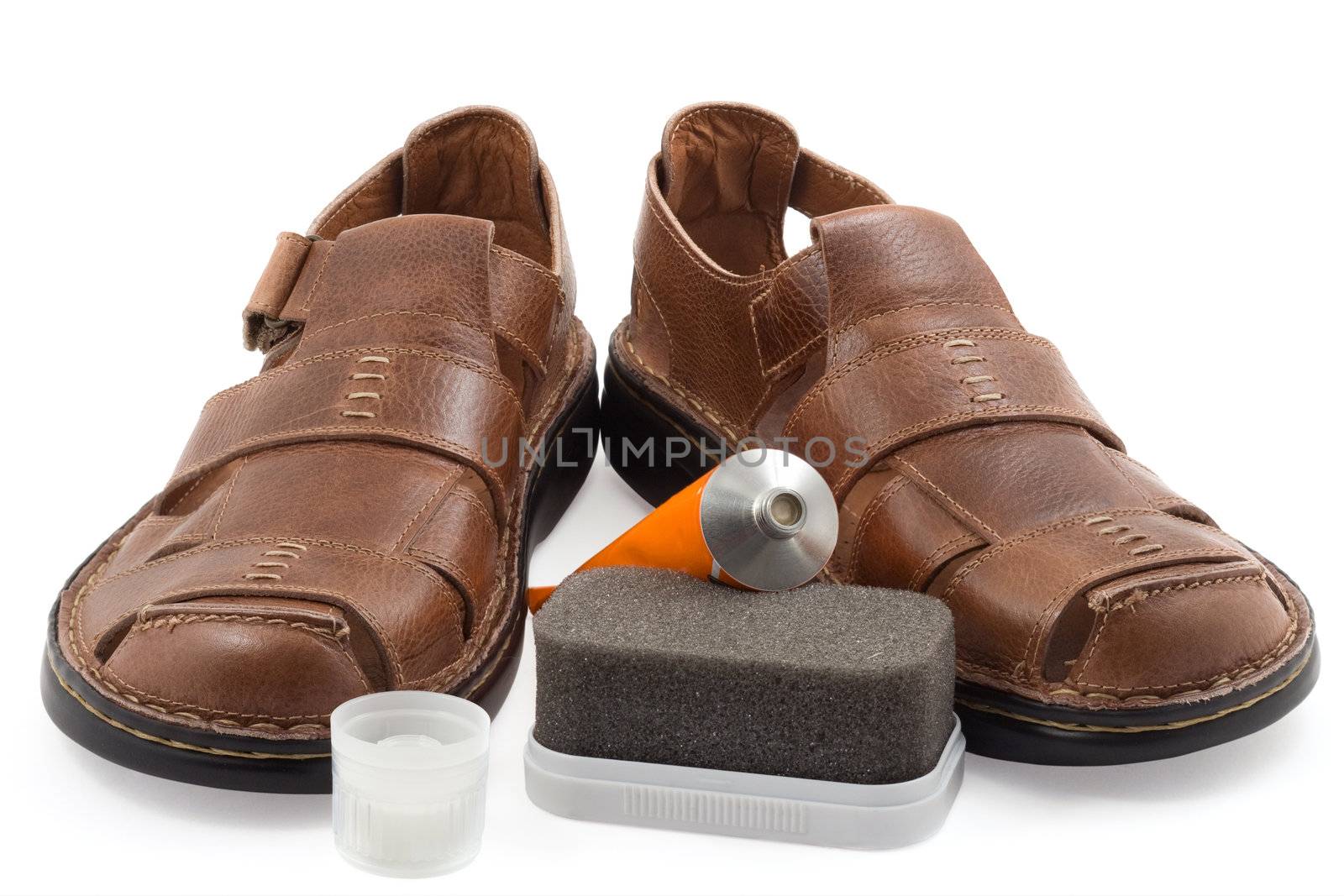 New leather sandals on a white background