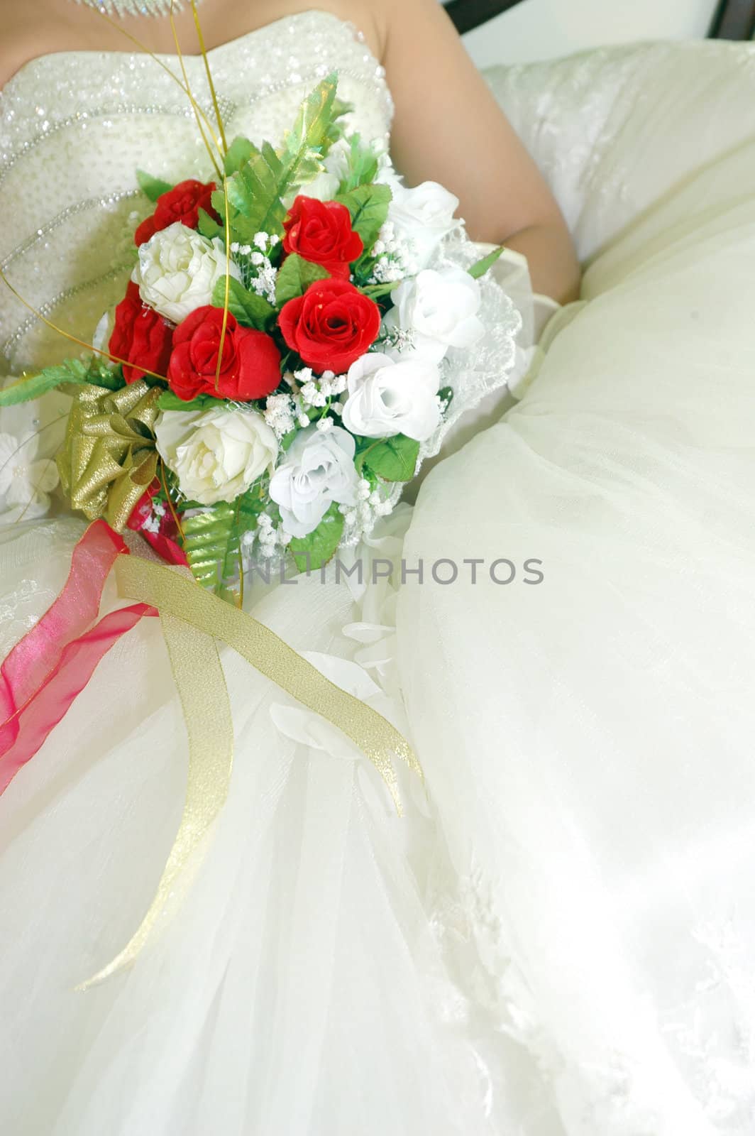 bridal bouquet of flowers held by bride