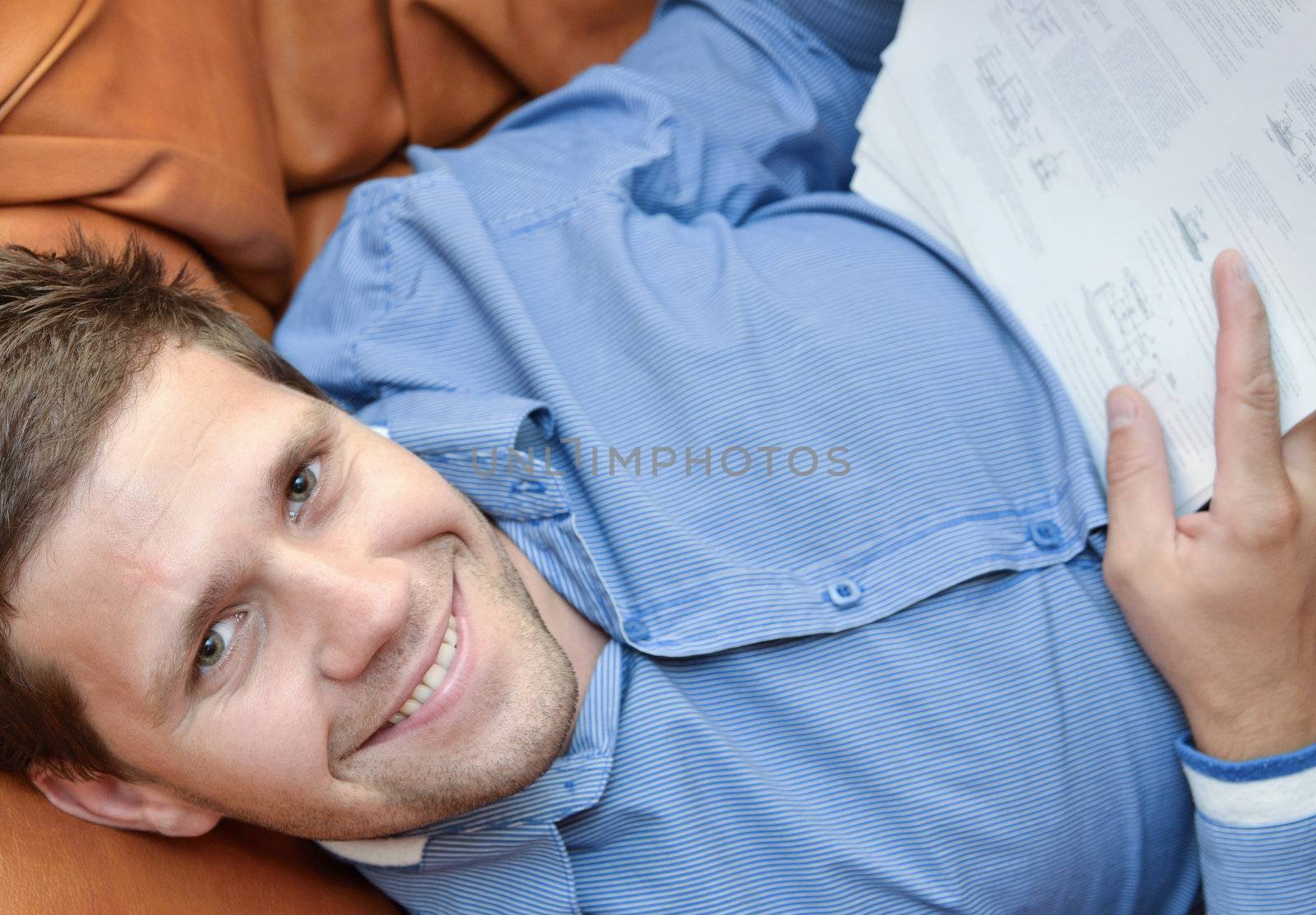 Professional young man smiling and looking at camera