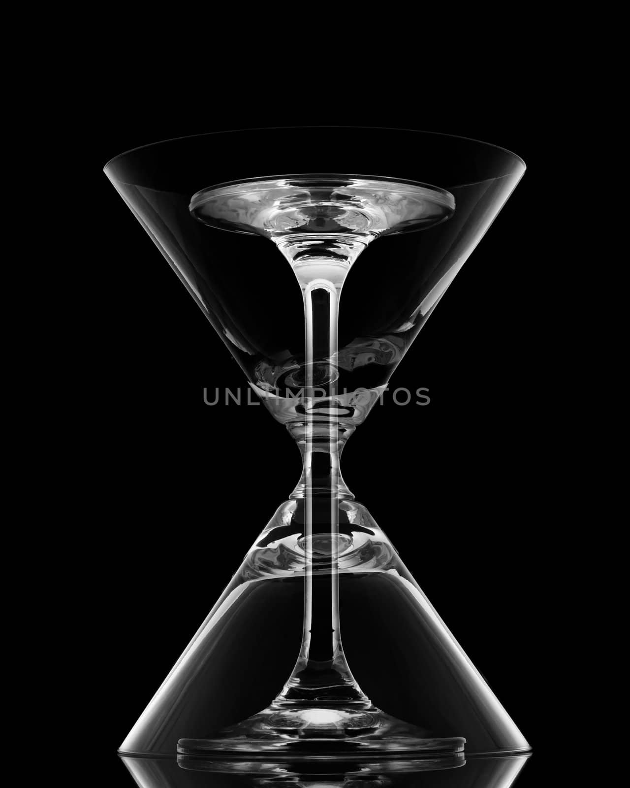 Mixing of Cocktail glasses on black background and reflection by nuttakit