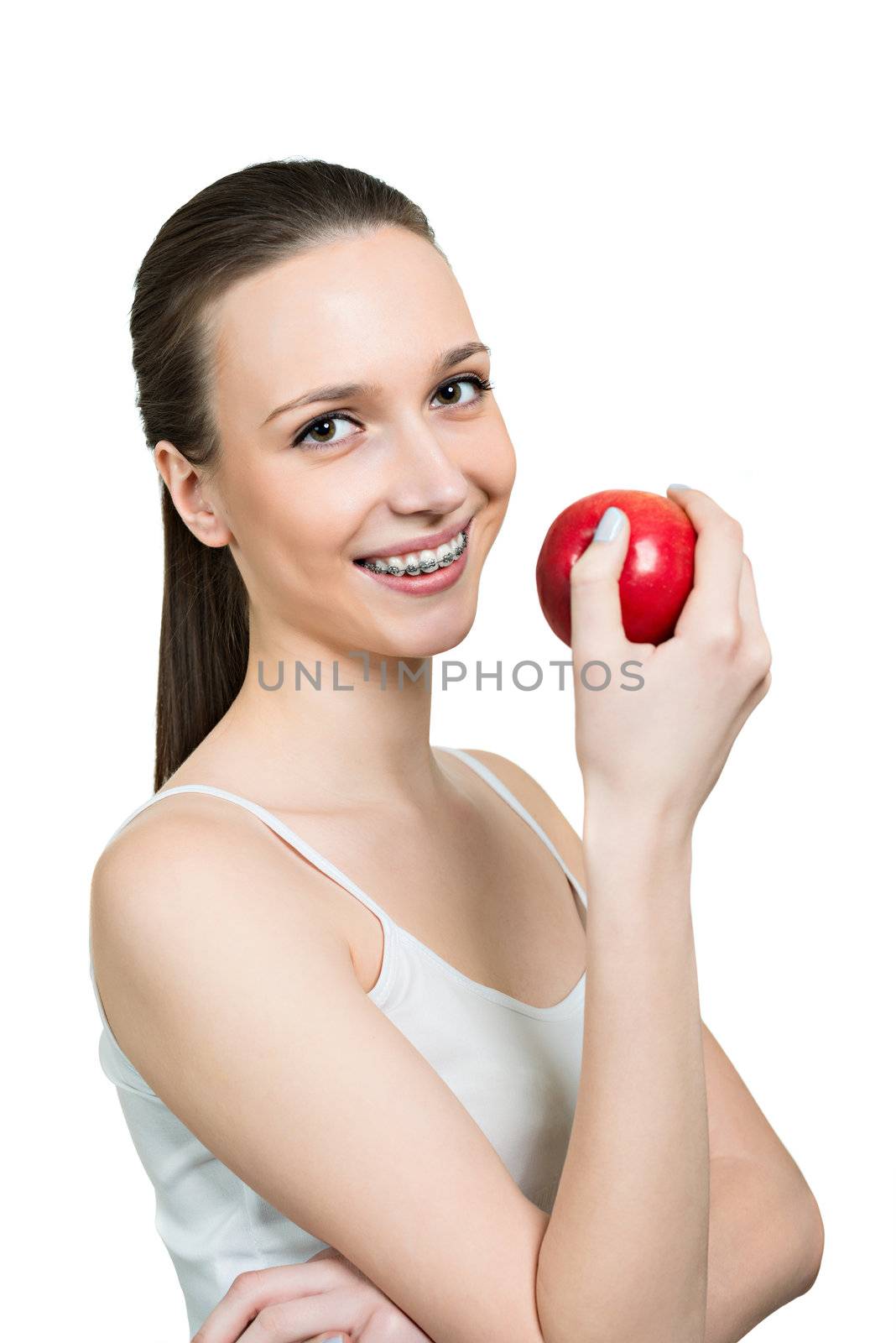 Beautiful young woman with brackets on teeth close up isolated