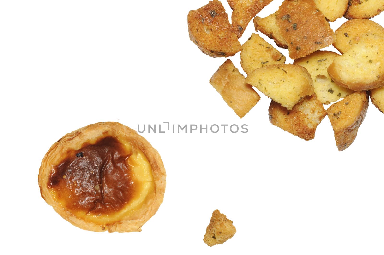closeup of delicious bread croutons and egg tarts