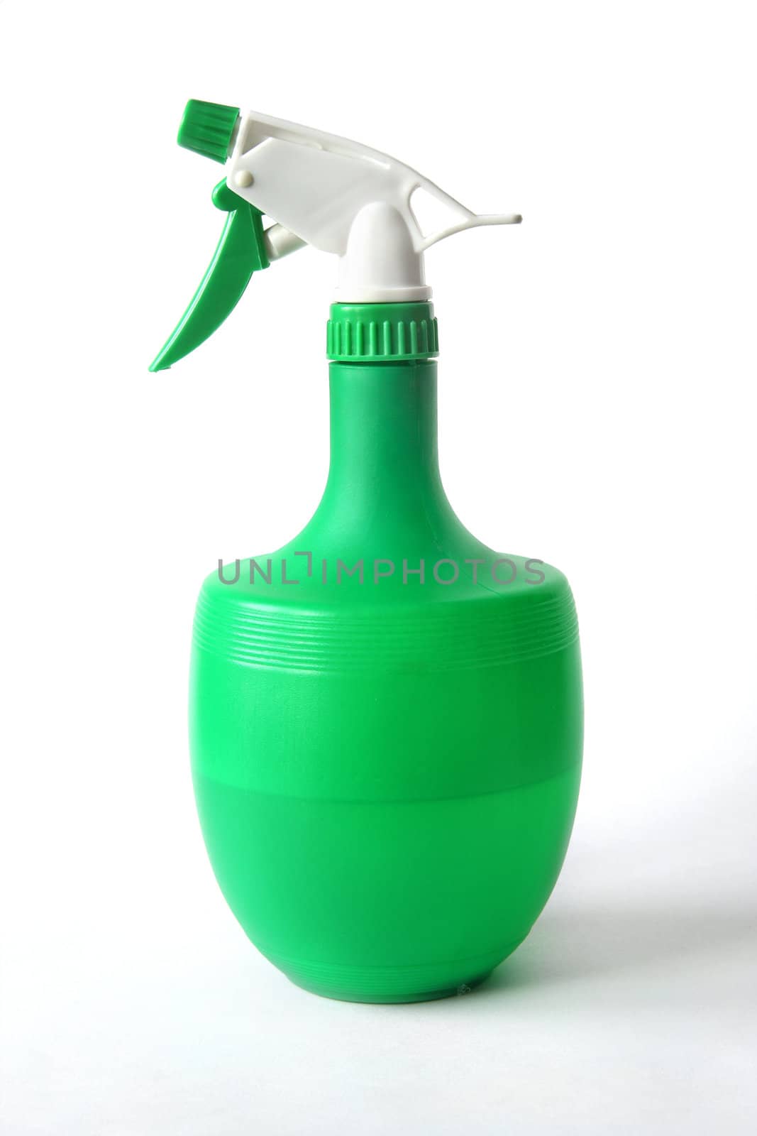Sprayer of green color on a white background