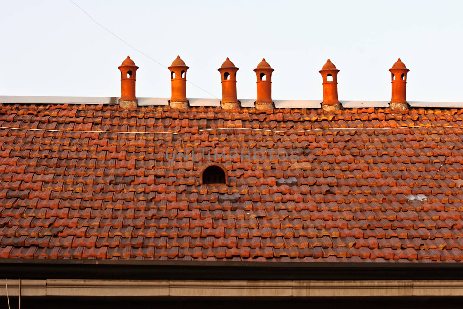 Six chimneys on tiles roof