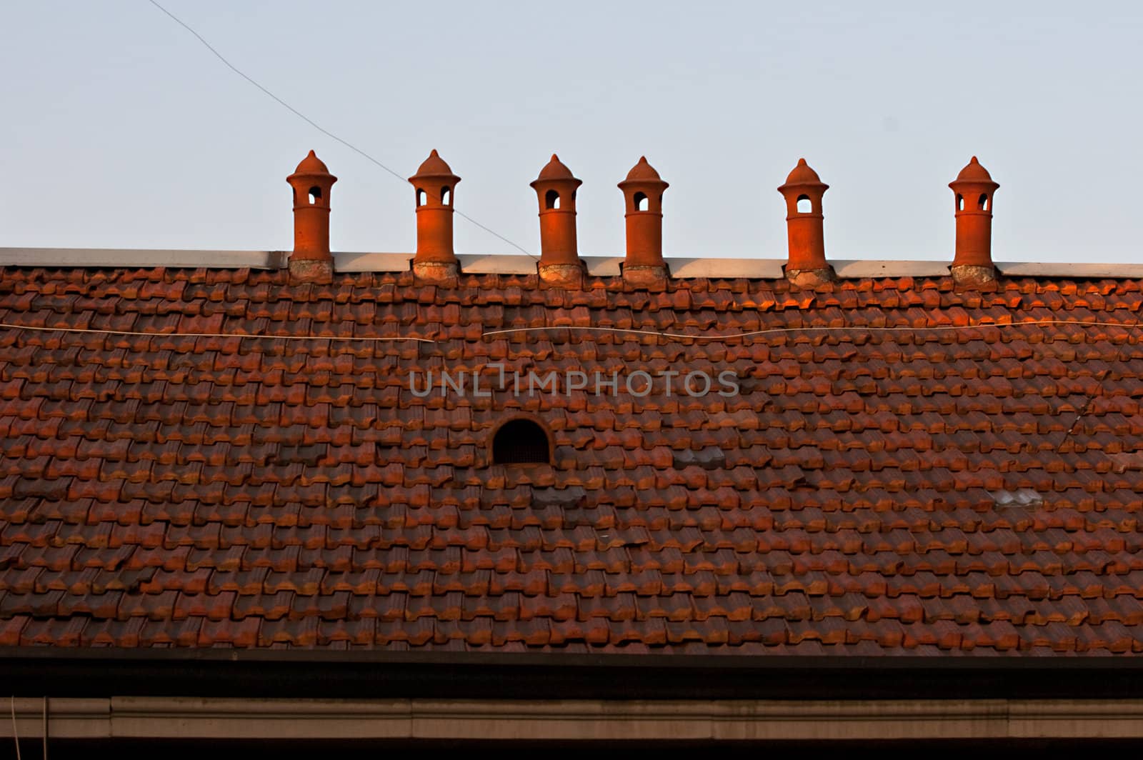 Six chimneys on tiles roof