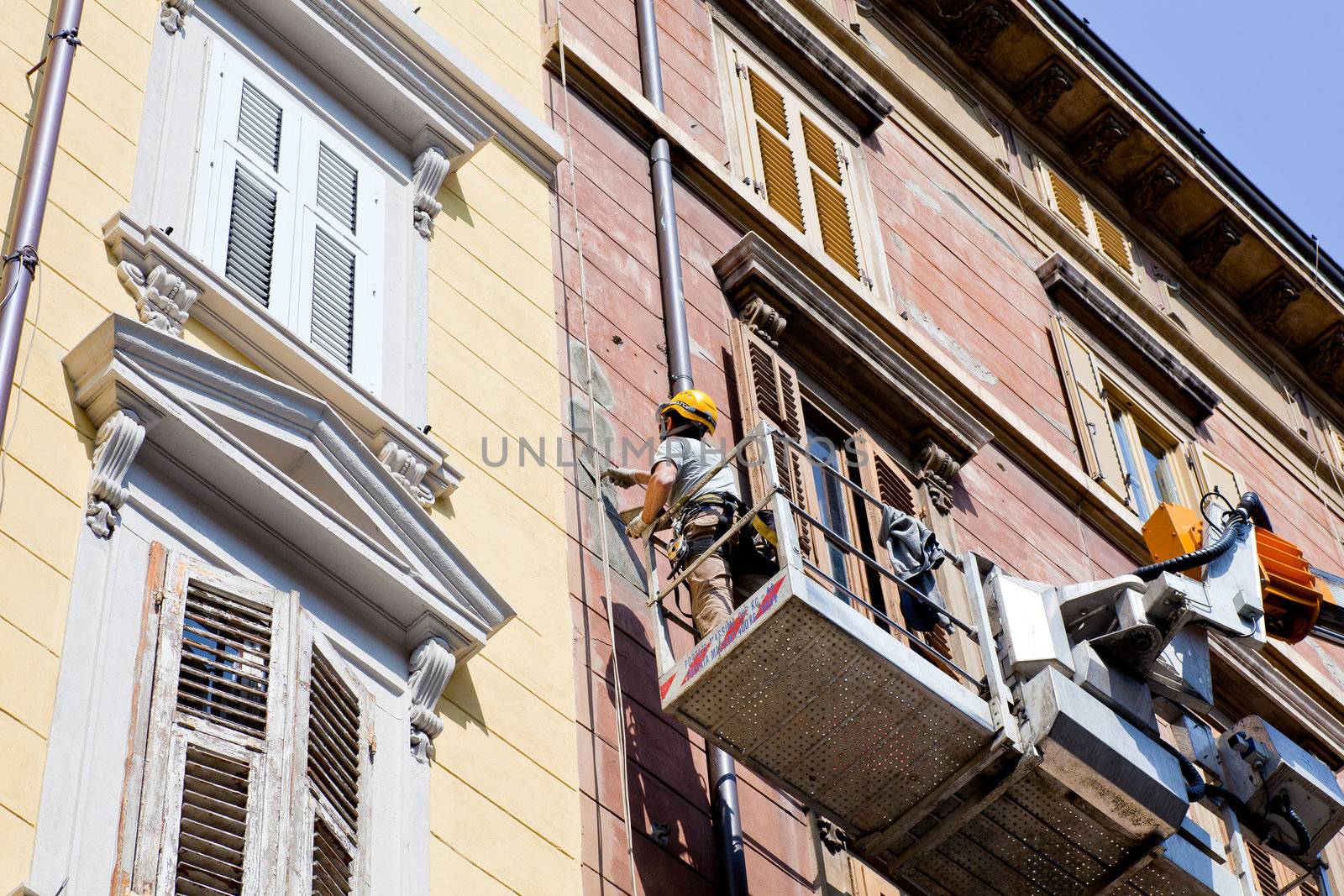 Worker on a mobile crane