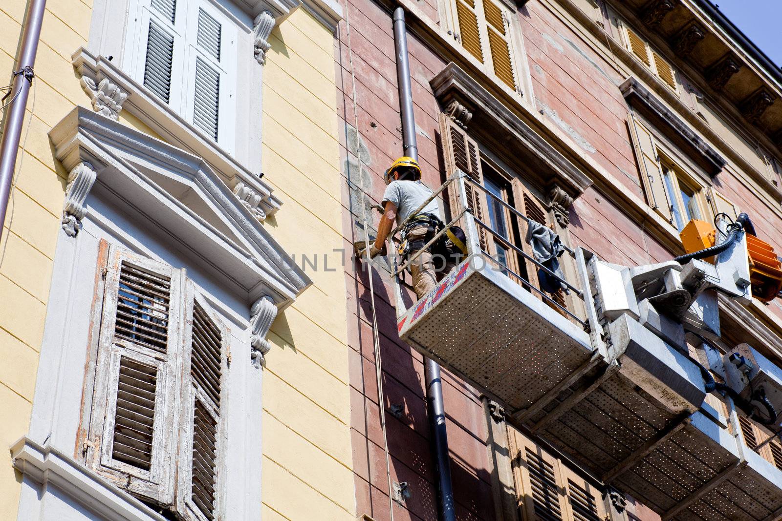 Worker on a mobile crane