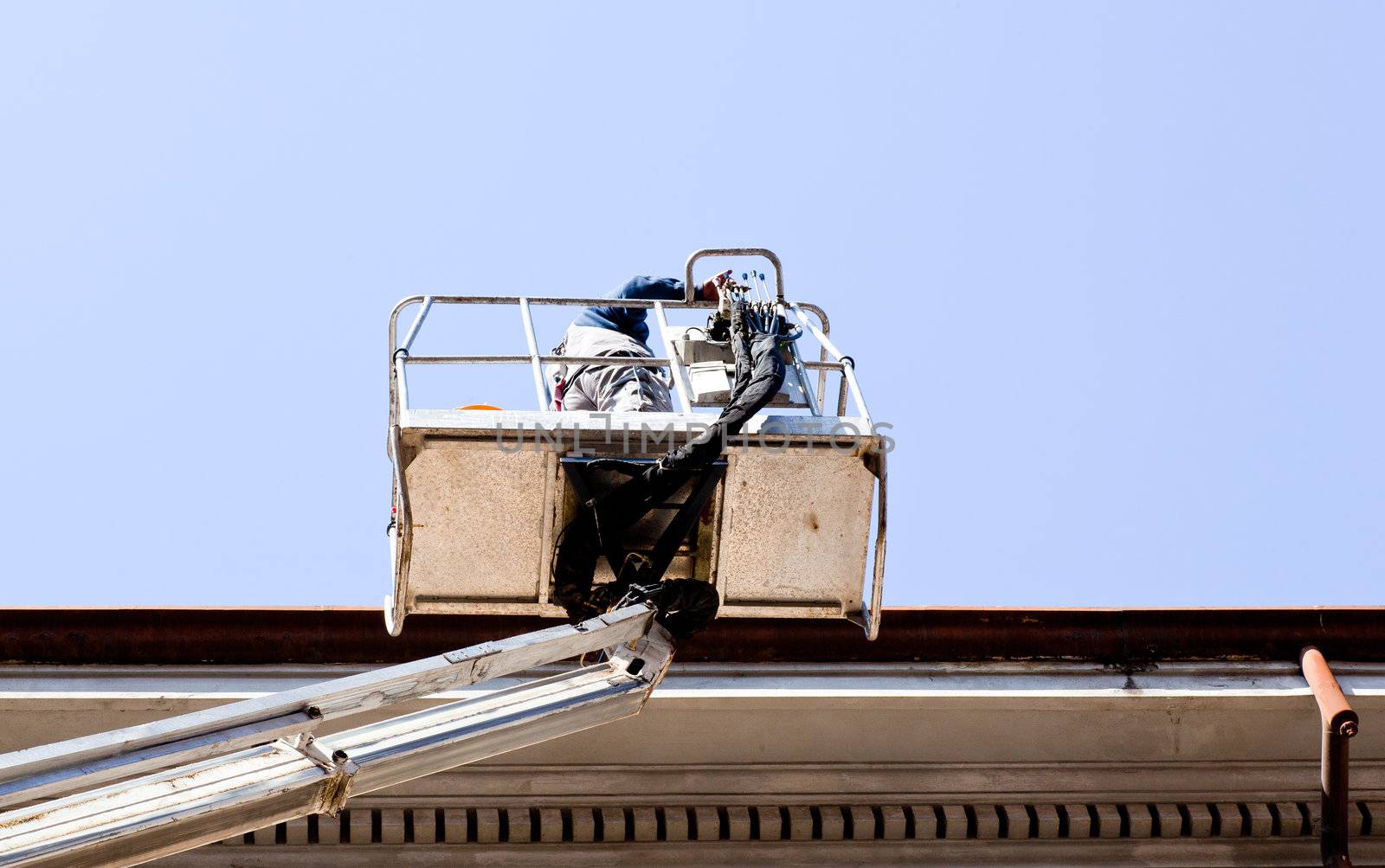 Worker on a mobile crane
