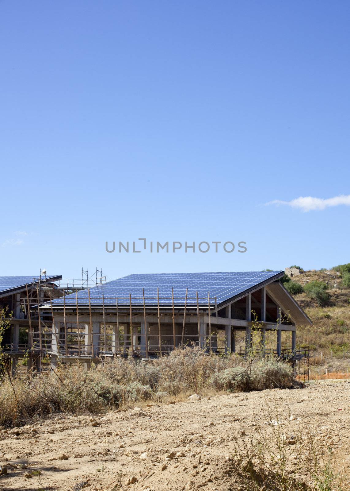 Solar panels in a house under construction, Italy