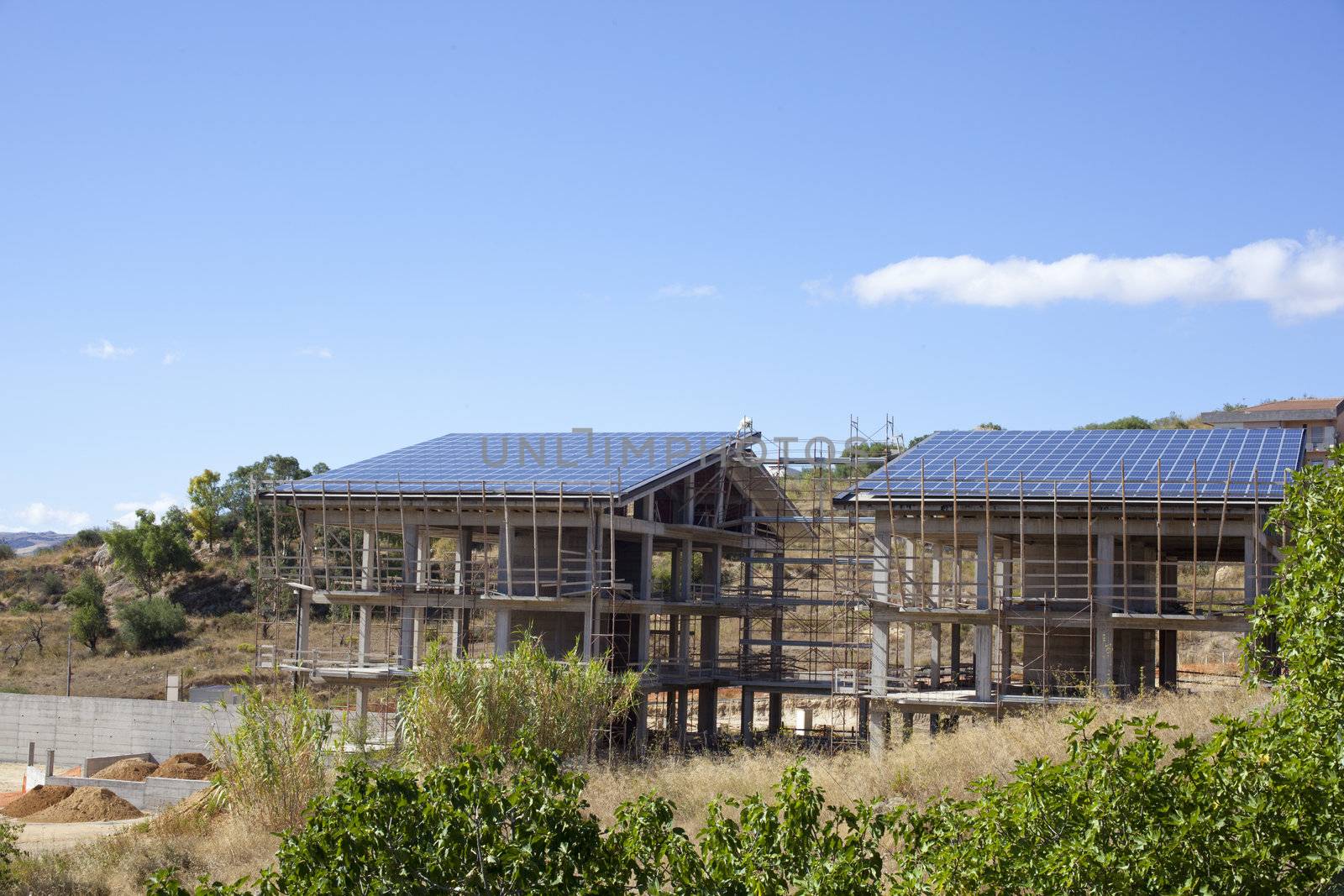 Solar panels in a house under construction, Italy