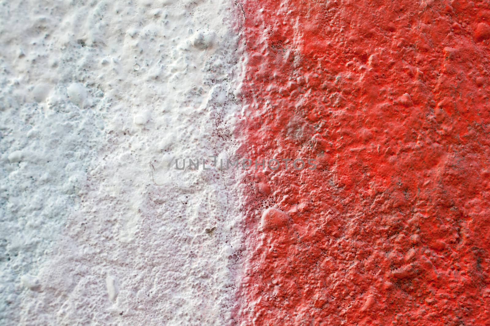 Red color on a white wall