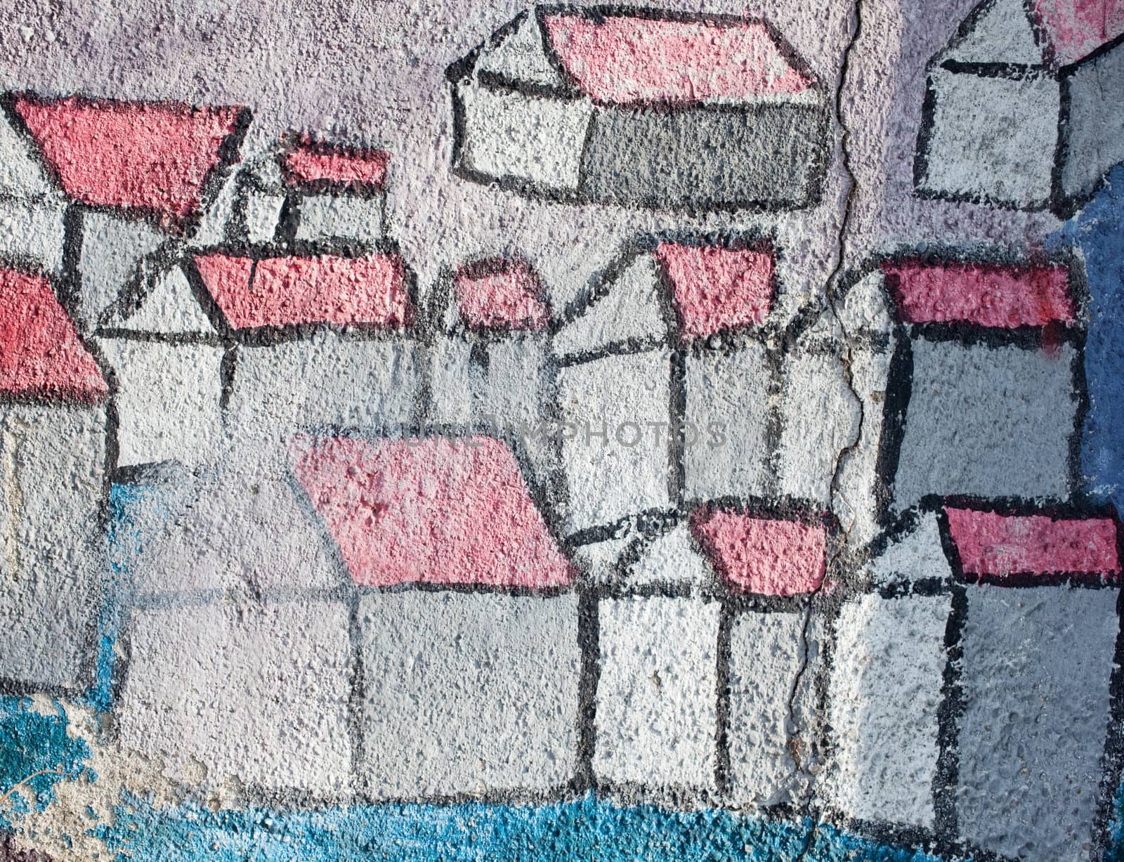 Graffiti, stylized houses painted on the wall