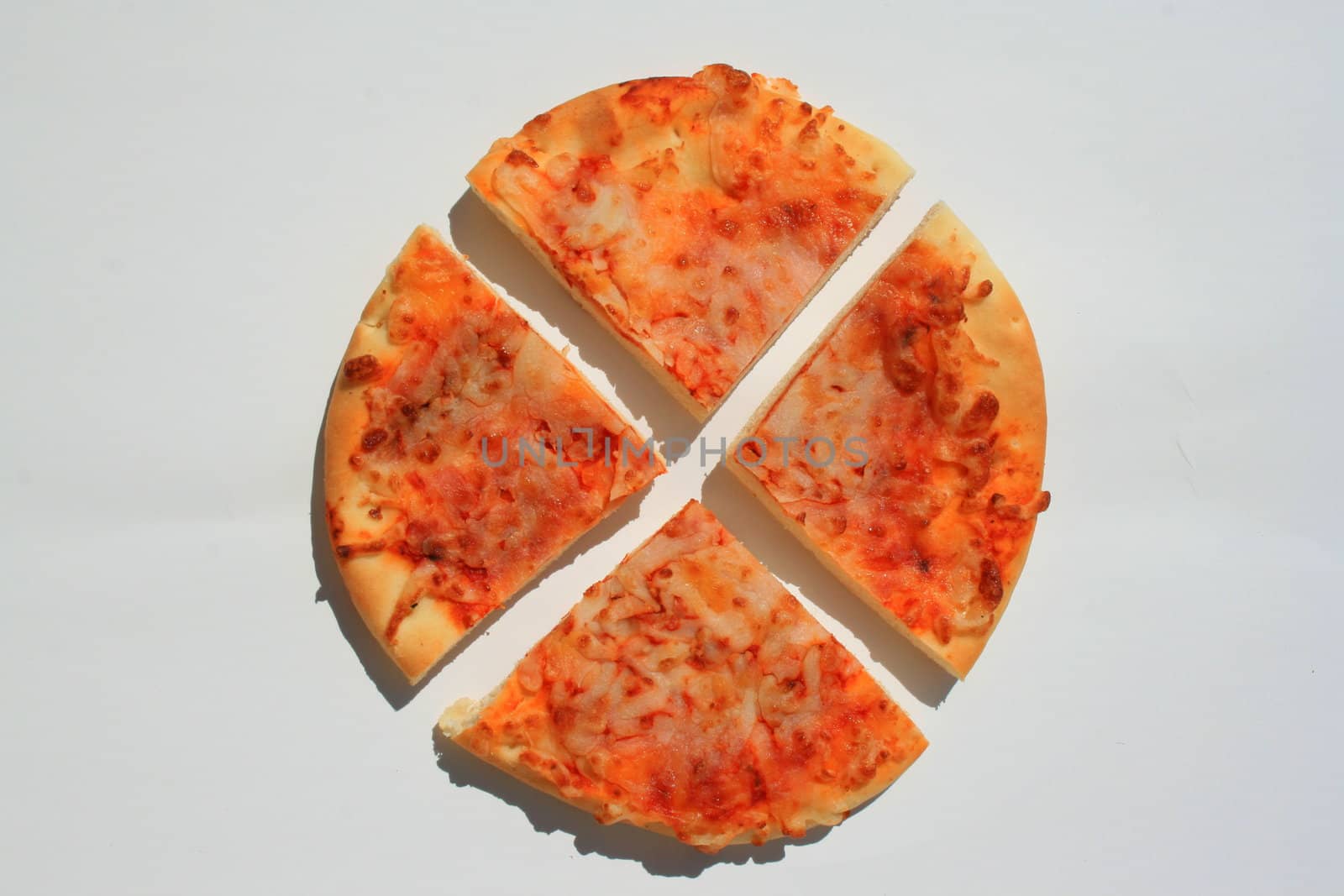 Close up of a mini cheese pizza slices.
