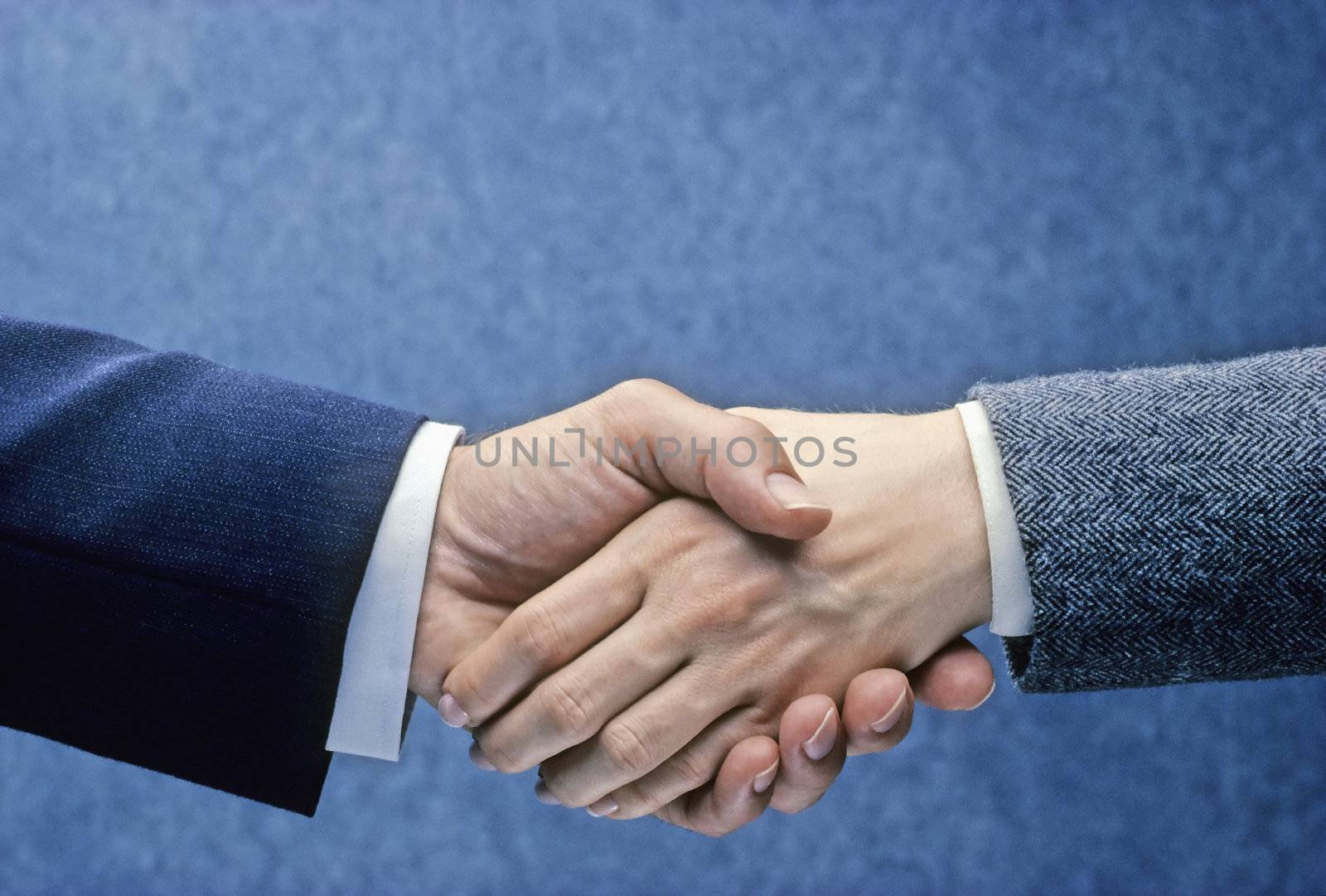 Handshake by edbockstock