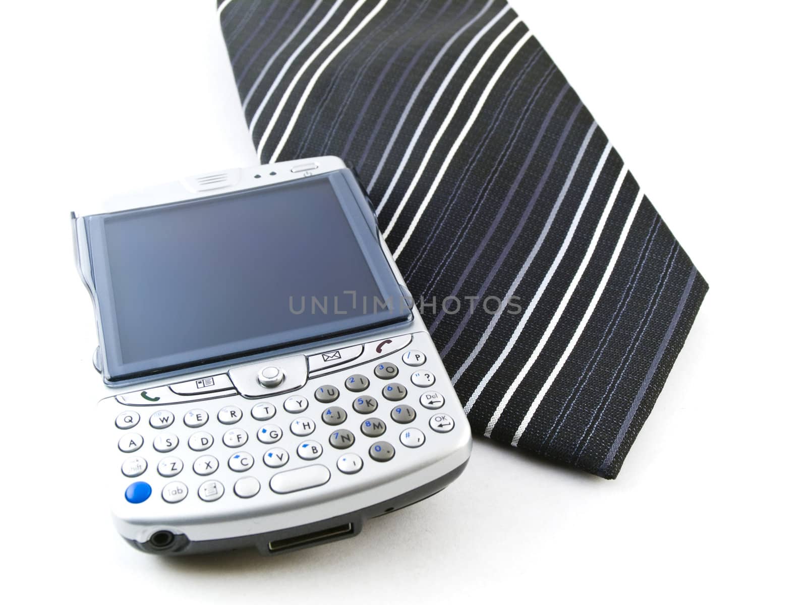 Mobile Phone and Tie on White Background