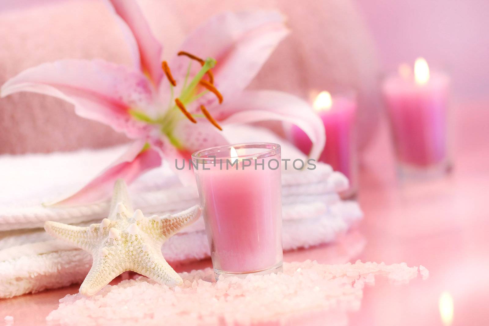 Pink soothing spa feeling with flower and pink candles