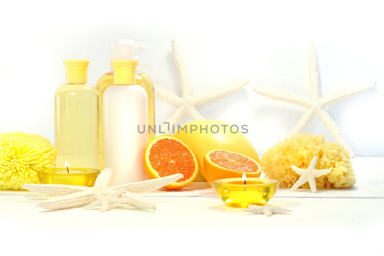 Orange spa products with candles