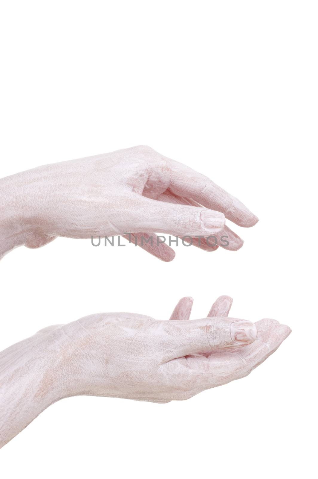 hydrating cream on the hands, isolated on white